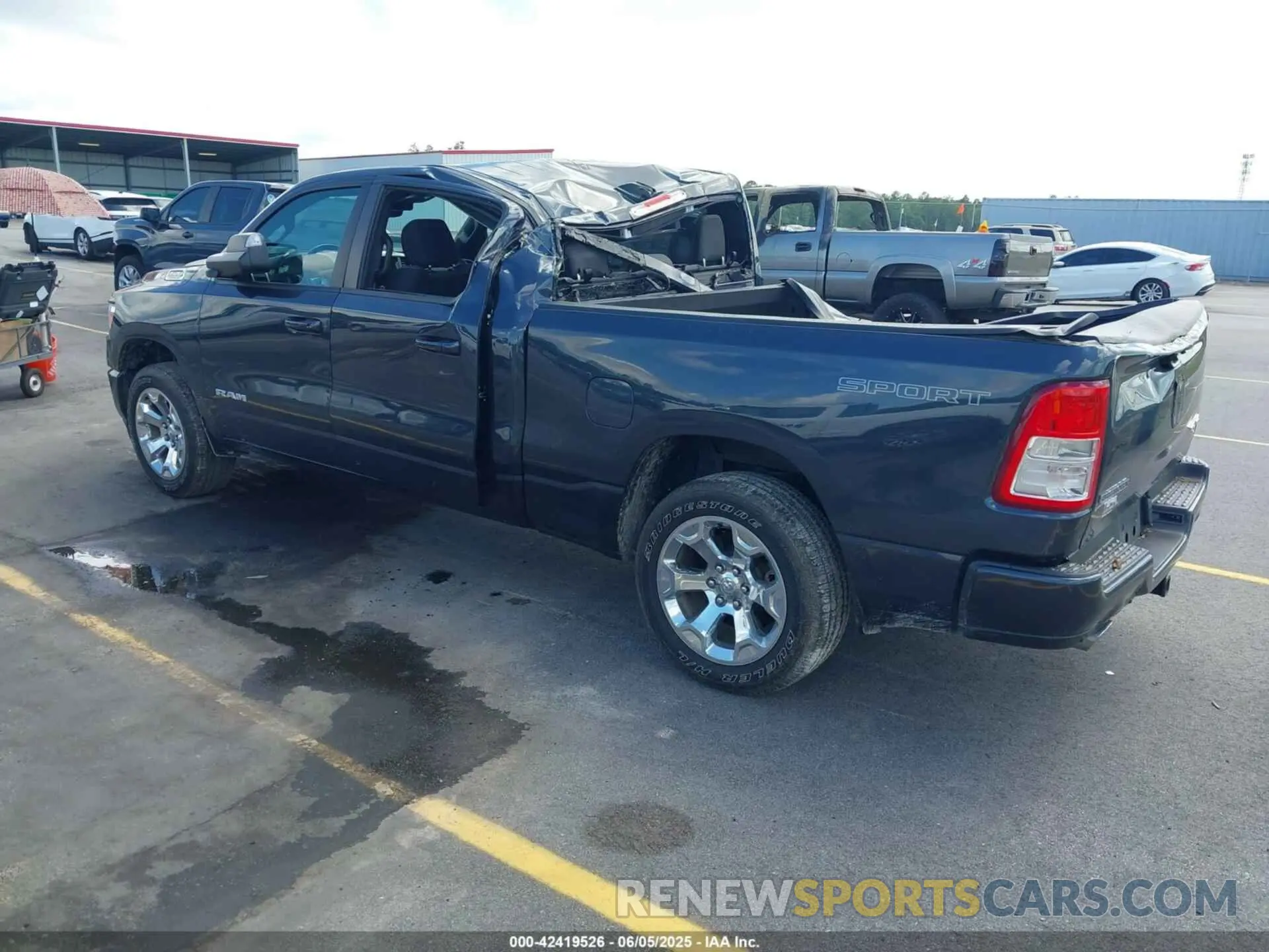 3 Photograph of a damaged car 1C6SRFMT4MN663514 RAM 1500 2021