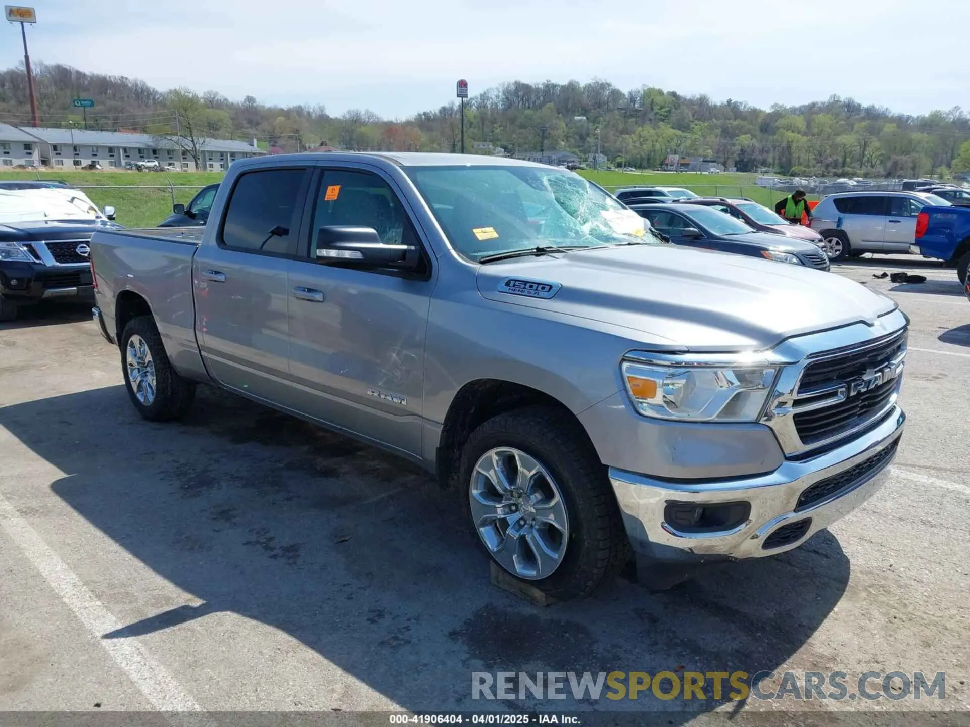 1 Photograph of a damaged car 1C6SRFMT9MN613806 RAM 1500 2021