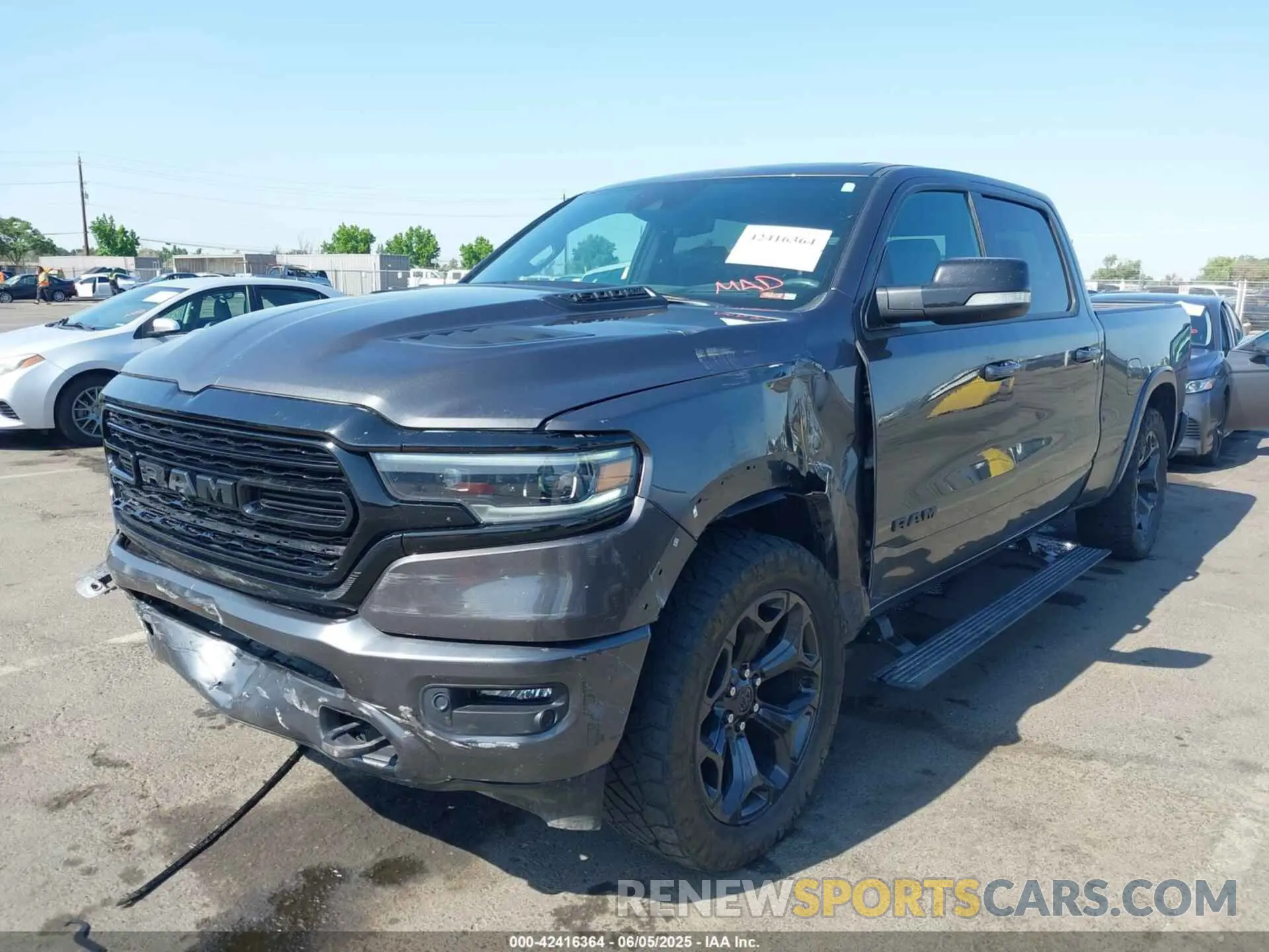 2 Photograph of a damaged car 1C6SRFPT2MN830643 RAM 1500 2021