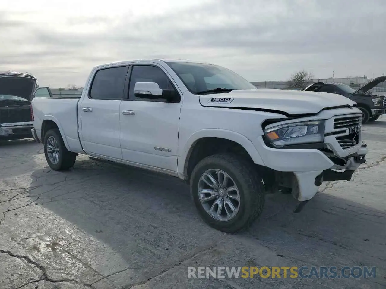 4 Photograph of a damaged car 1C6SRFRT4MN831791 RAM 1500 2021