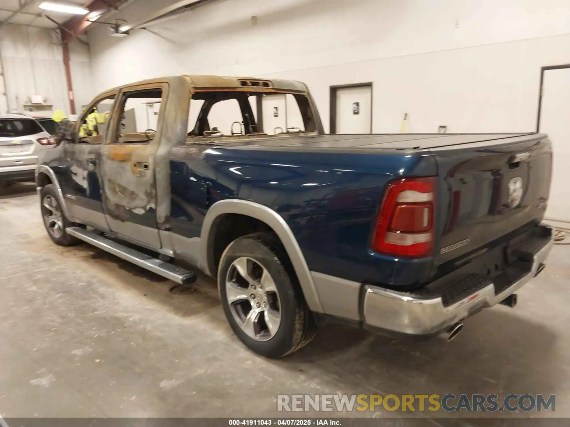 3 Photograph of a damaged car 1C6SRFRT4MN834741 RAM 1500 2021
