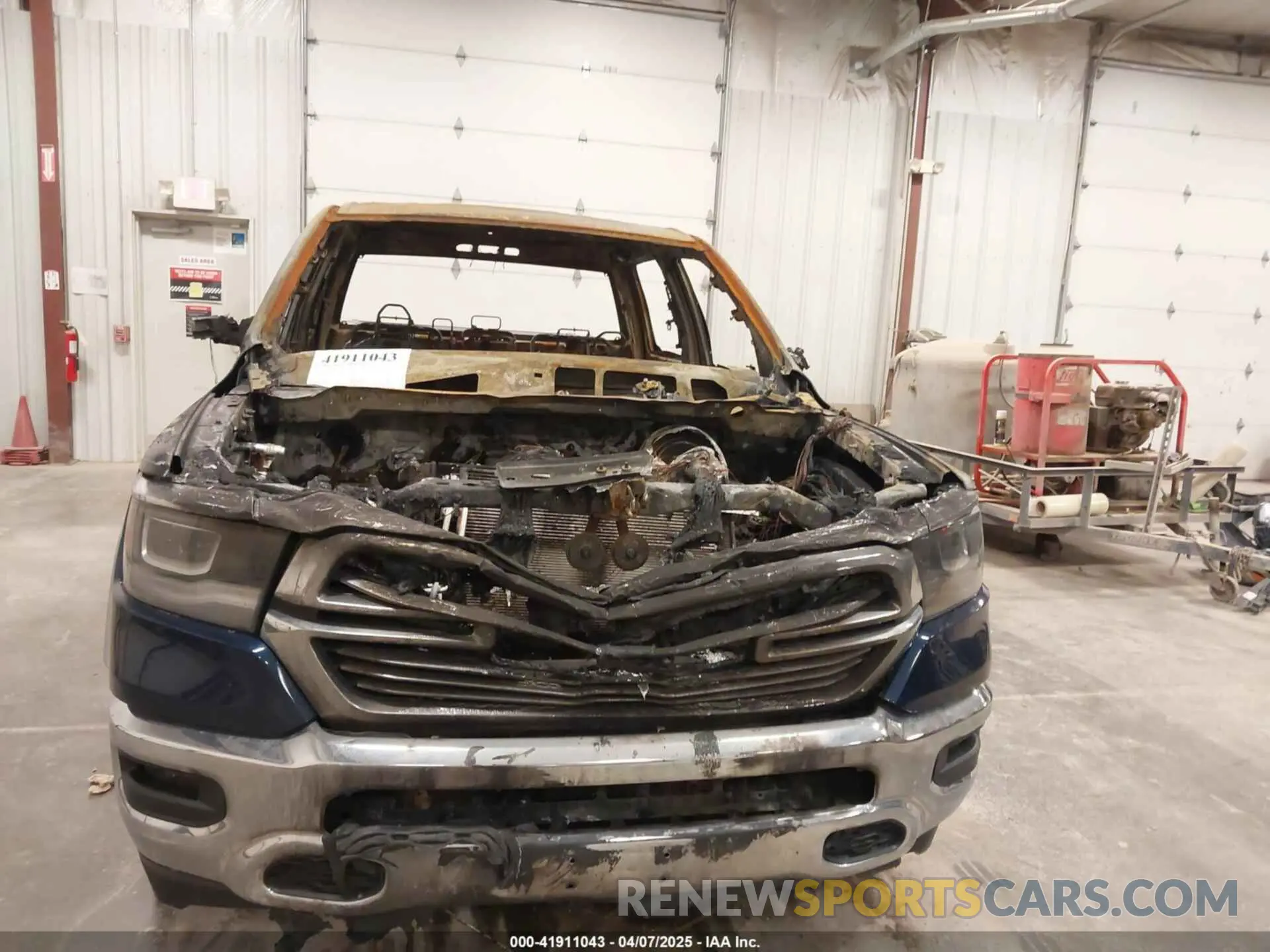 6 Photograph of a damaged car 1C6SRFRT4MN834741 RAM 1500 2021