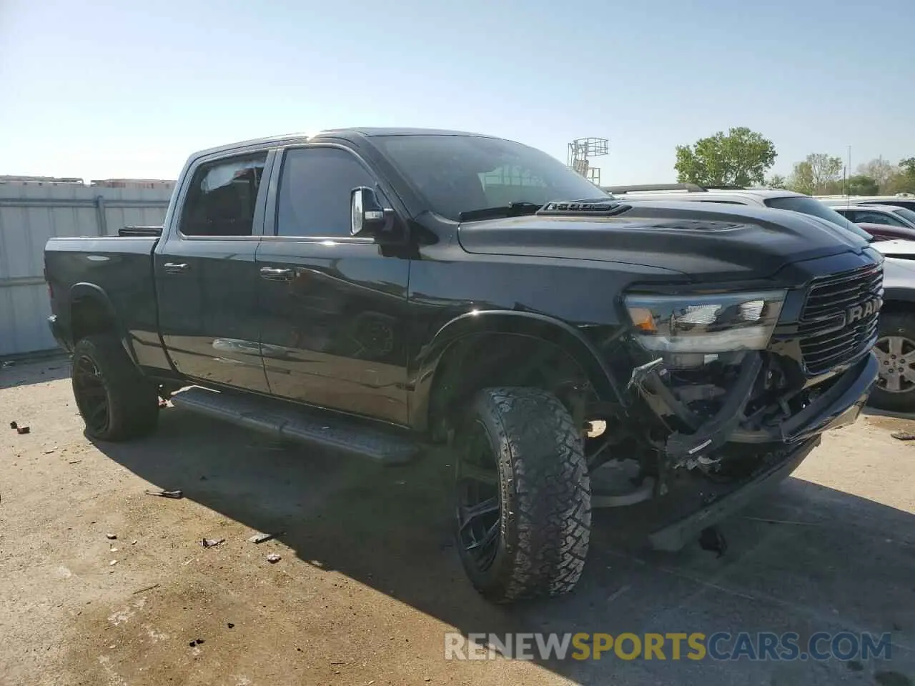 4 Photograph of a damaged car 1C6SRFRT7MN778438 RAM 1500 2021