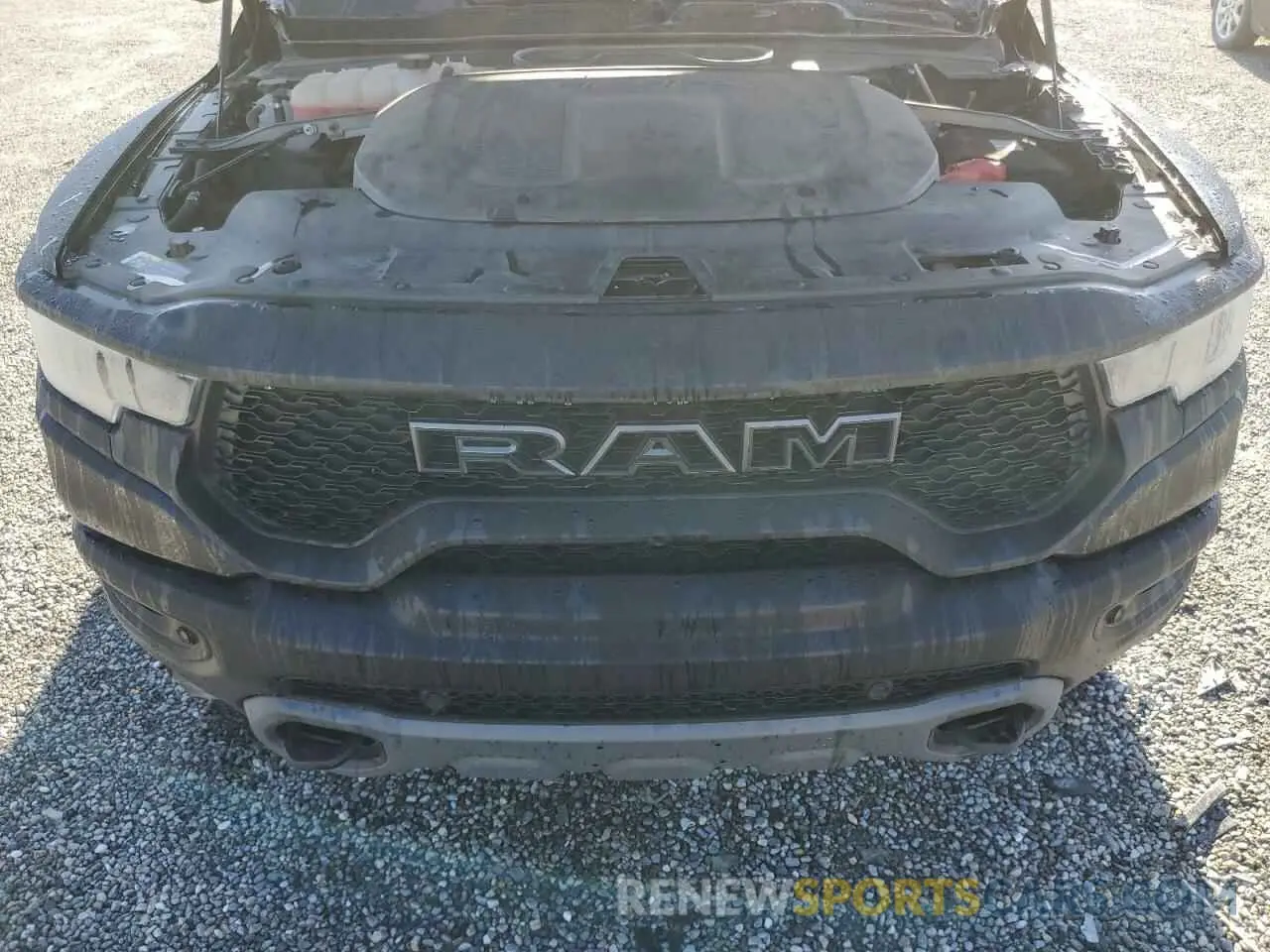 12 Photograph of a damaged car 1C6SRFU91MN723933 RAM 1500 2021