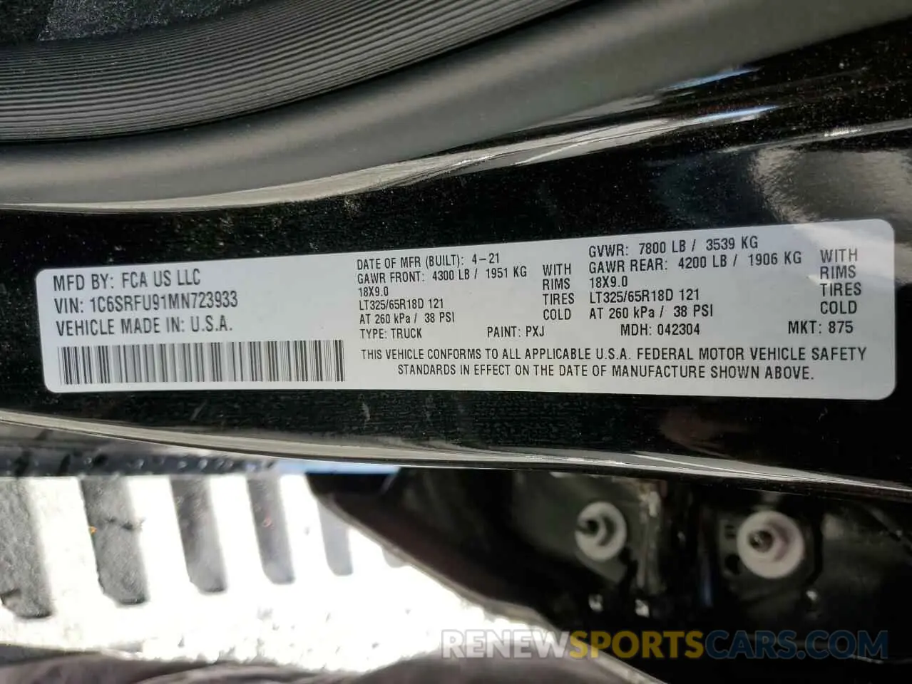 14 Photograph of a damaged car 1C6SRFU91MN723933 RAM 1500 2021