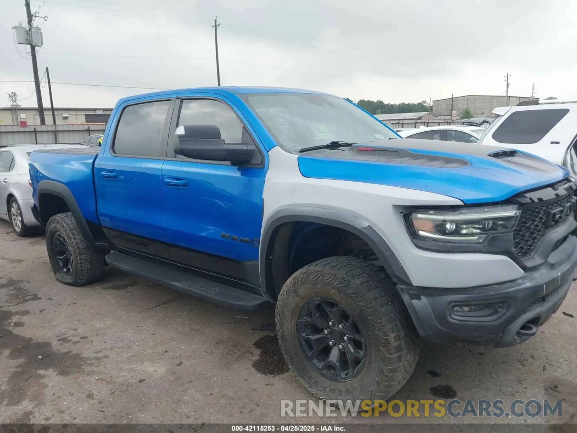 1 Photograph of a damaged car 1C6SRFU91MN790158 RAM 1500 2021