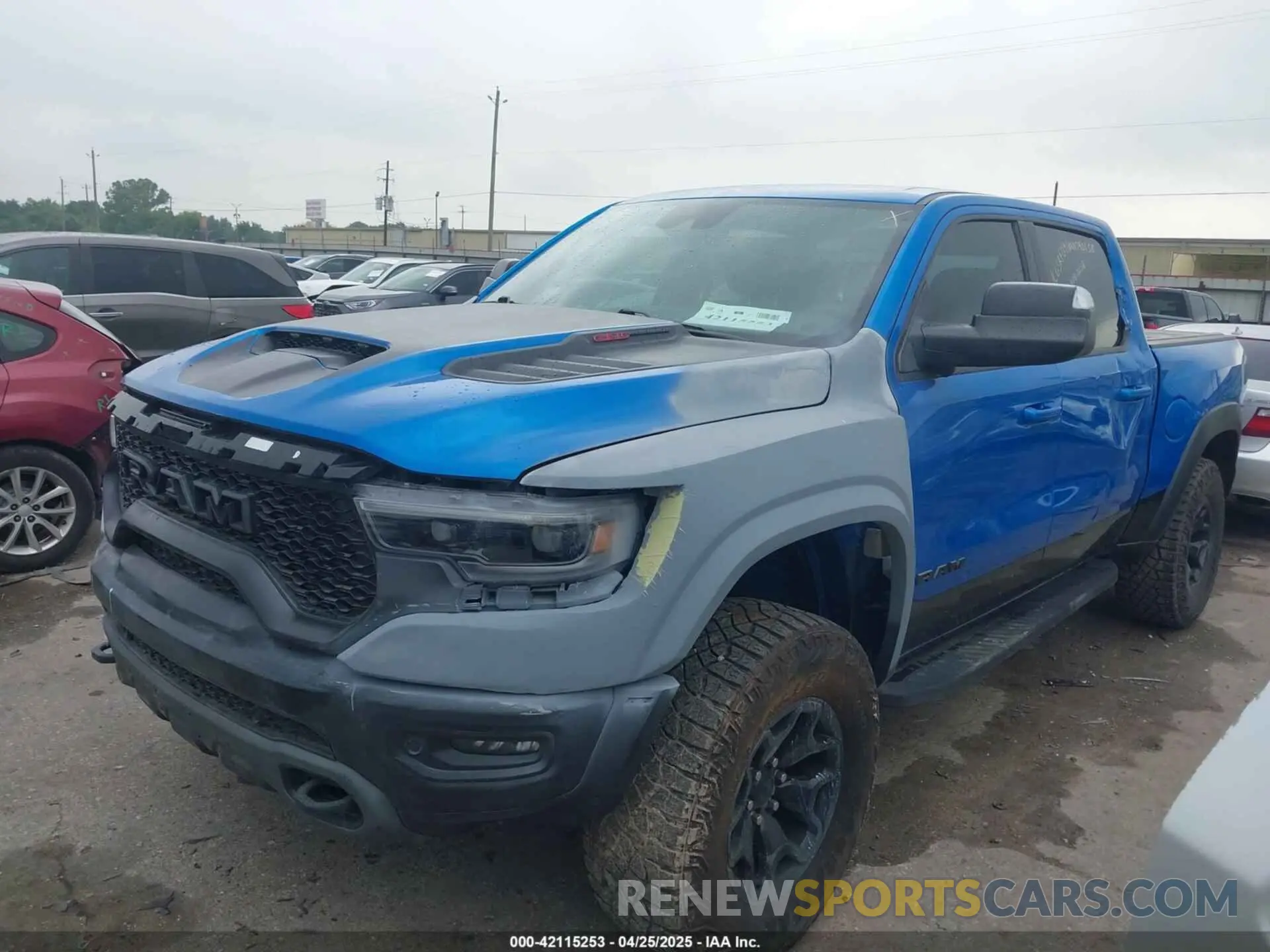 2 Photograph of a damaged car 1C6SRFU91MN790158 RAM 1500 2021
