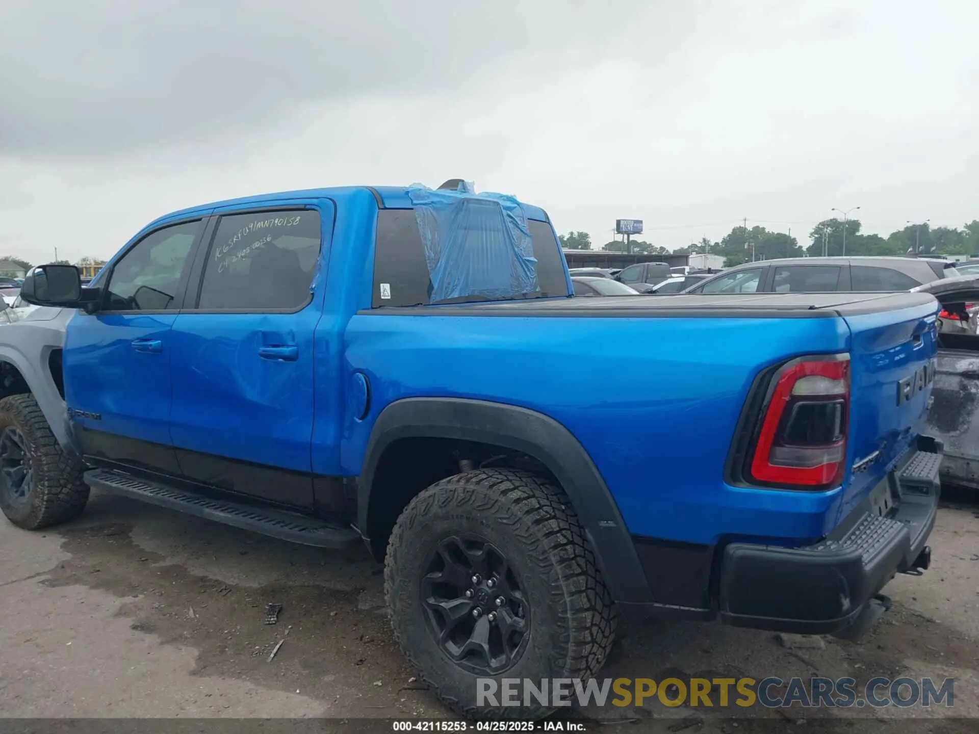 3 Photograph of a damaged car 1C6SRFU91MN790158 RAM 1500 2021