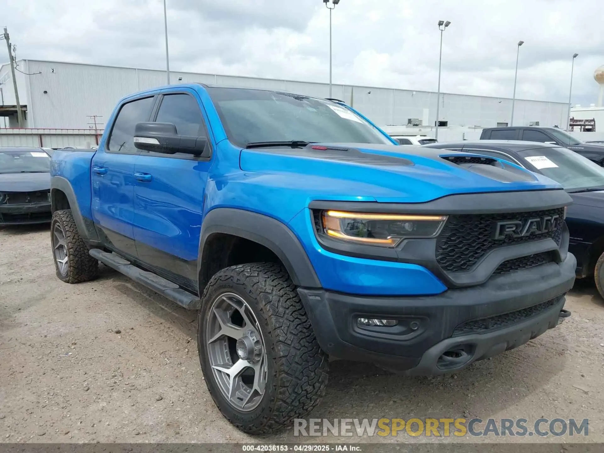 1 Photograph of a damaged car 1C6SRFU91MN903851 RAM 1500 2021