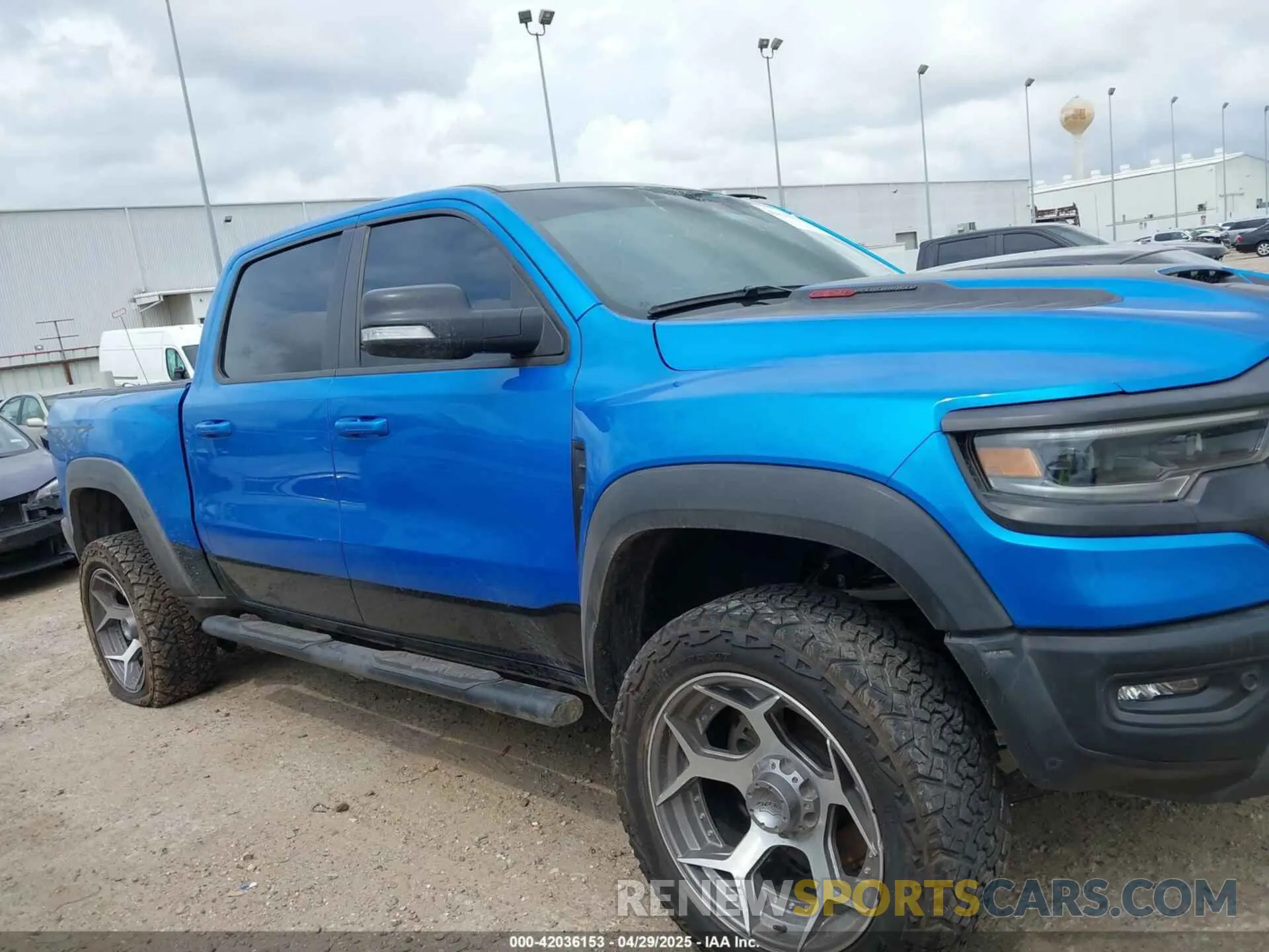 13 Photograph of a damaged car 1C6SRFU91MN903851 RAM 1500 2021