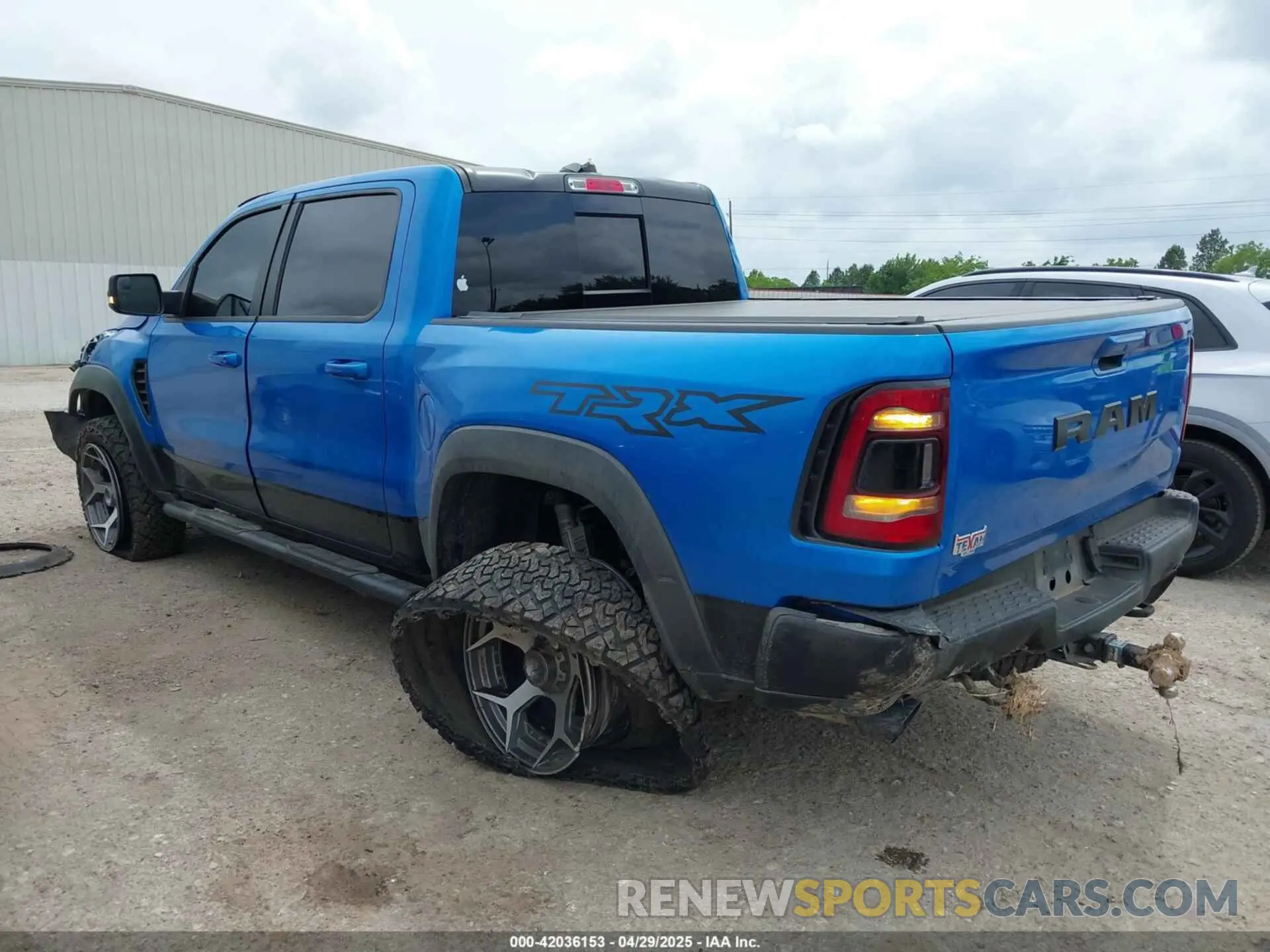 3 Photograph of a damaged car 1C6SRFU91MN903851 RAM 1500 2021