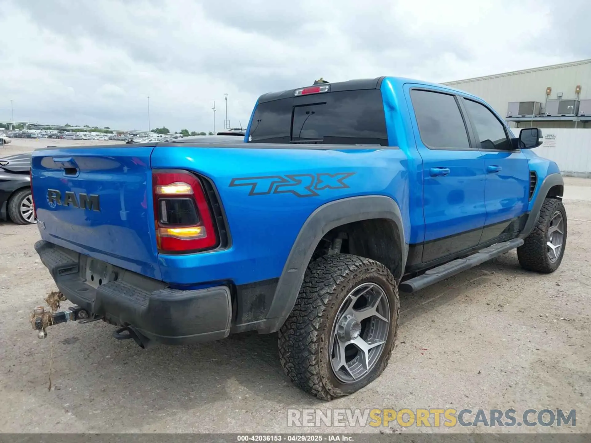 4 Photograph of a damaged car 1C6SRFU91MN903851 RAM 1500 2021
