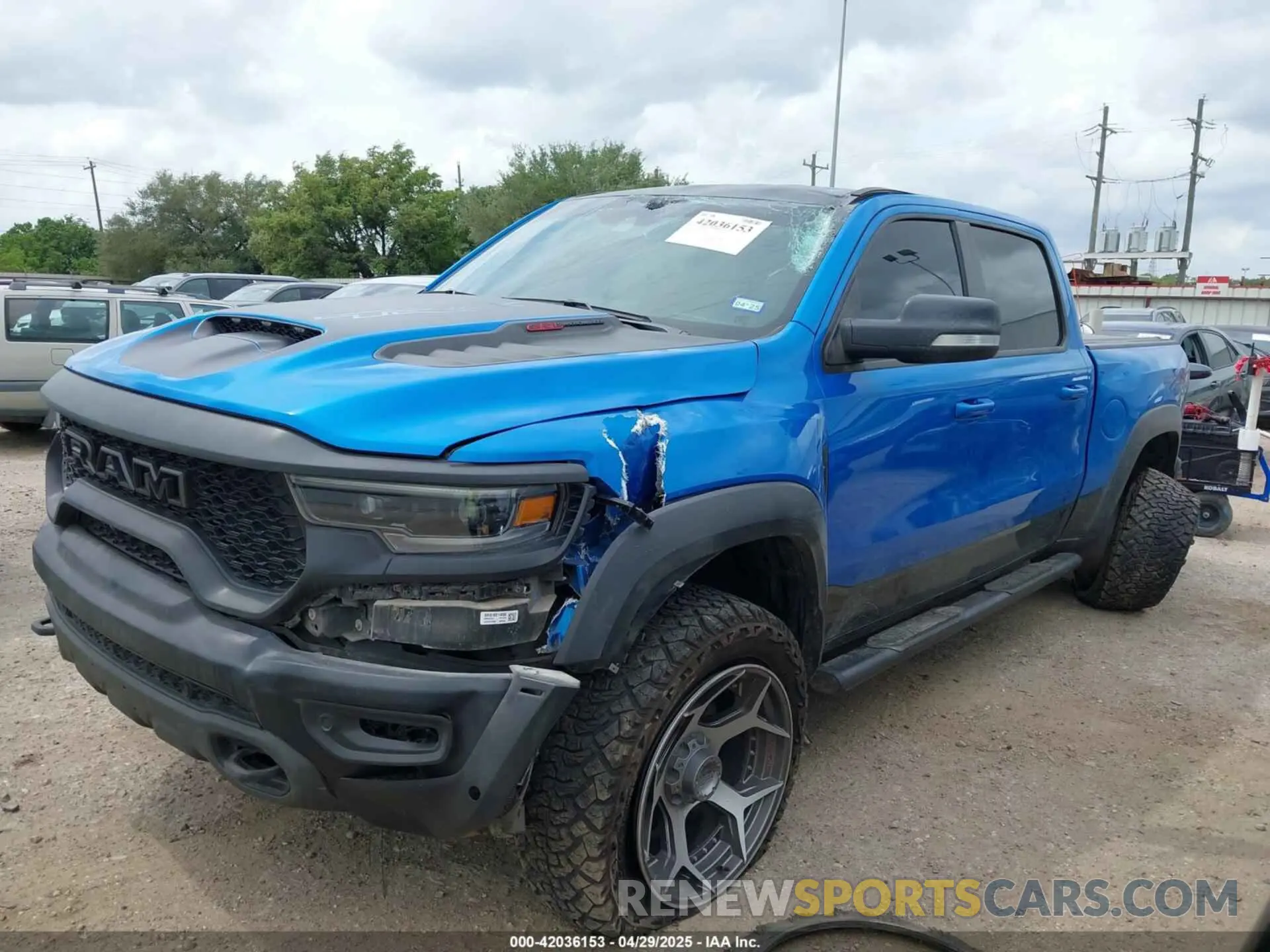 6 Photograph of a damaged car 1C6SRFU91MN903851 RAM 1500 2021