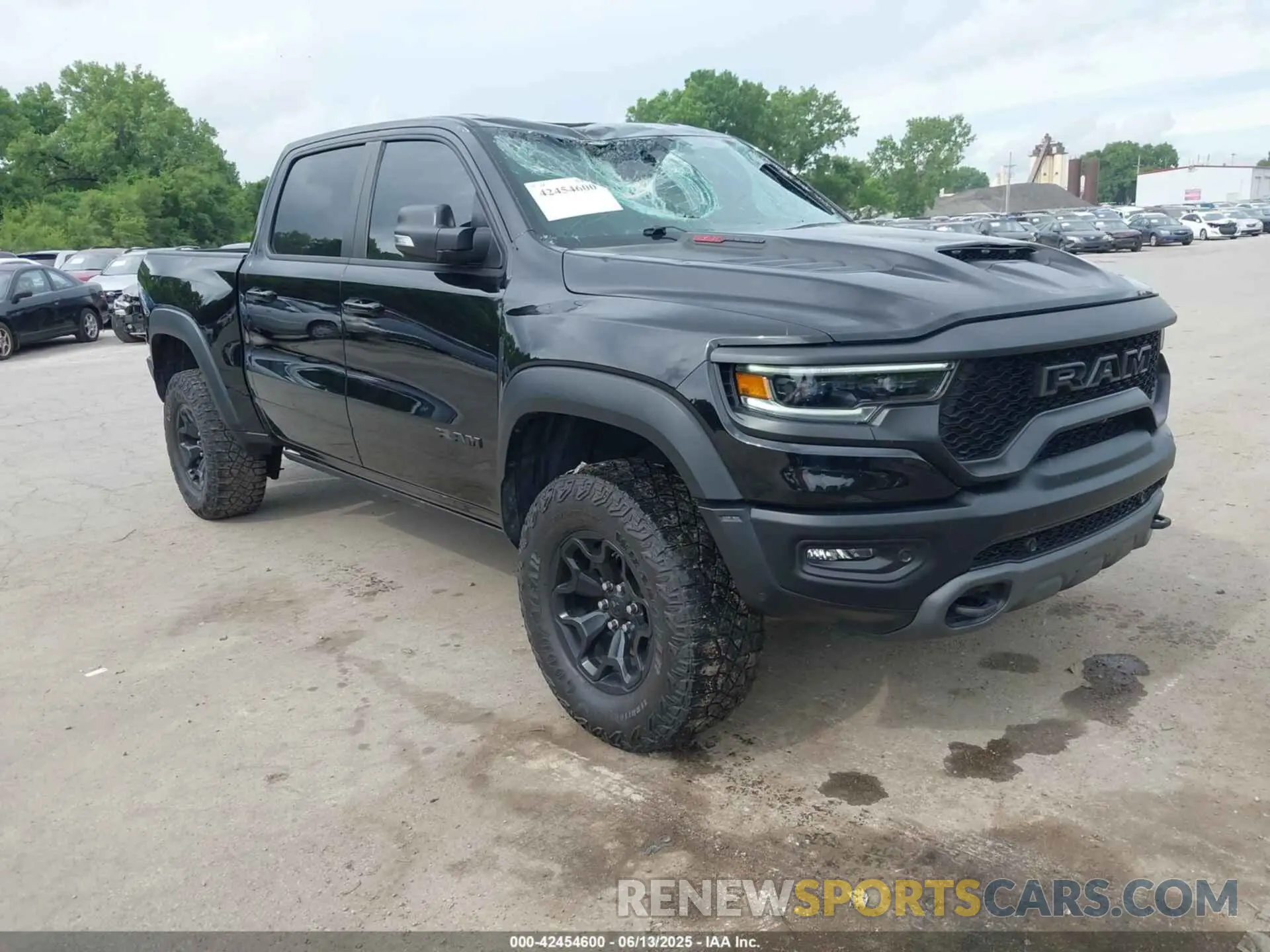 1 Photograph of a damaged car 1C6SRFU92MN685001 RAM 1500 2021