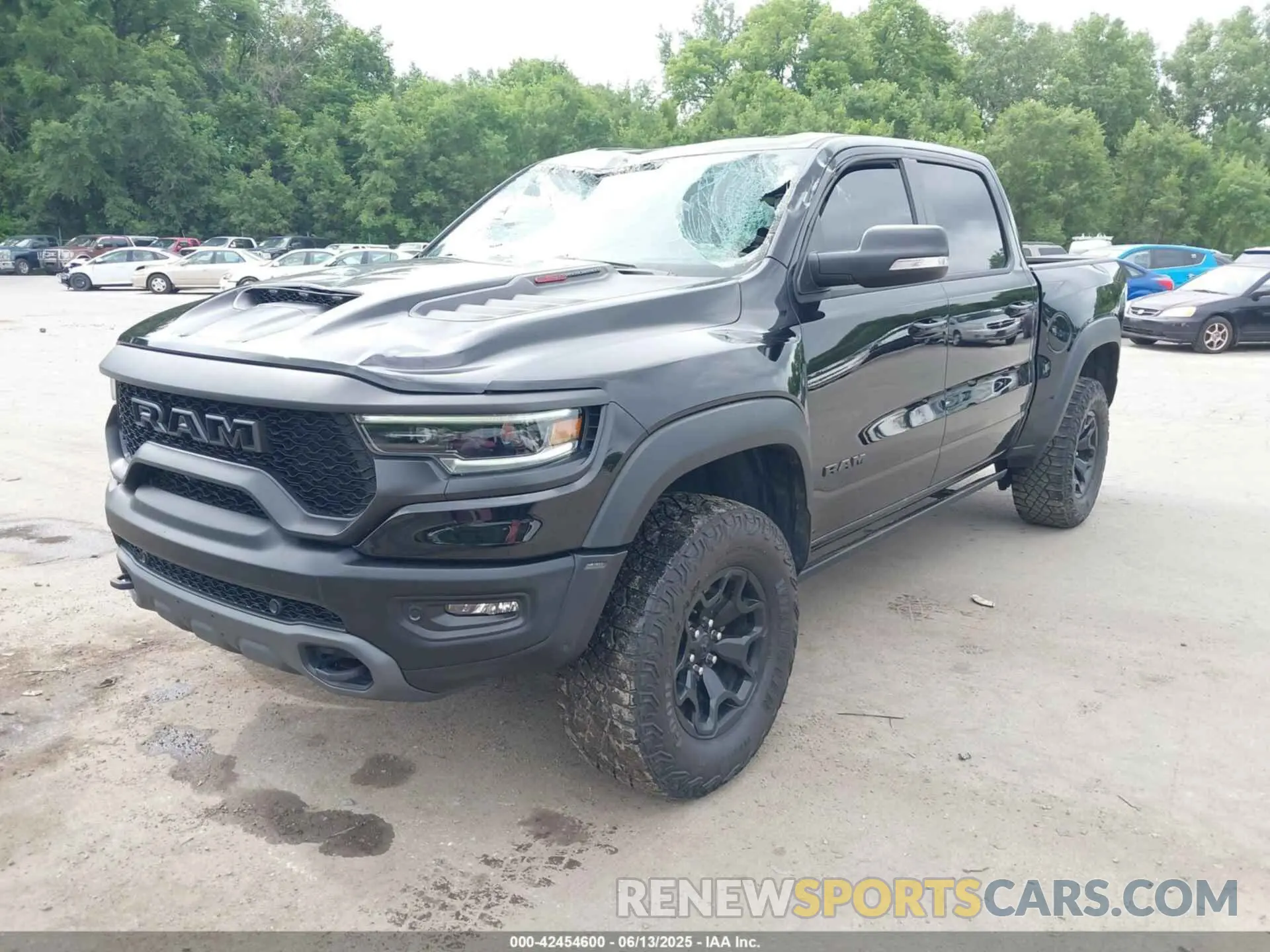 2 Photograph of a damaged car 1C6SRFU92MN685001 RAM 1500 2021