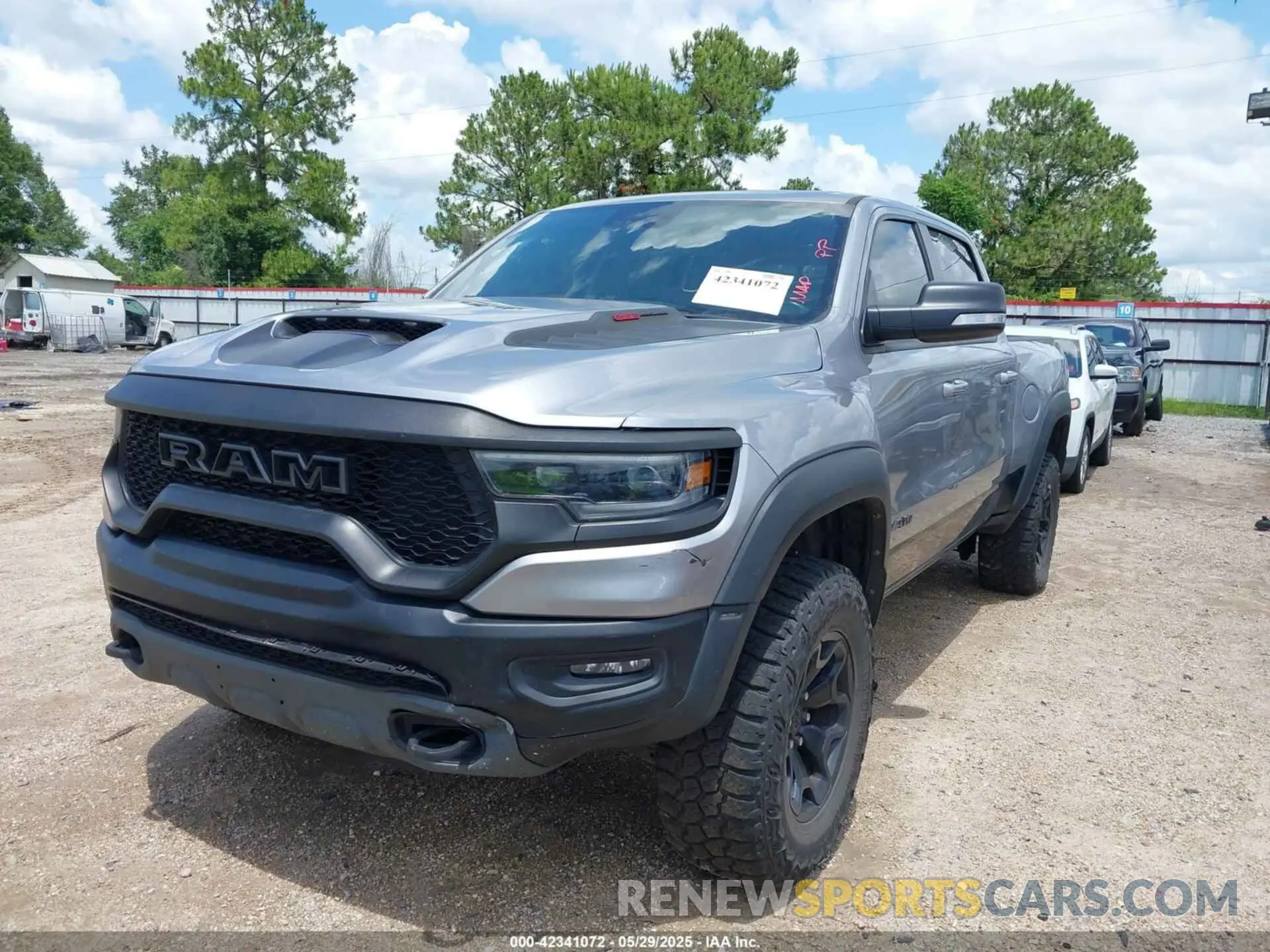 2 Photograph of a damaged car 1C6SRFU92MN819375 RAM 1500 2021