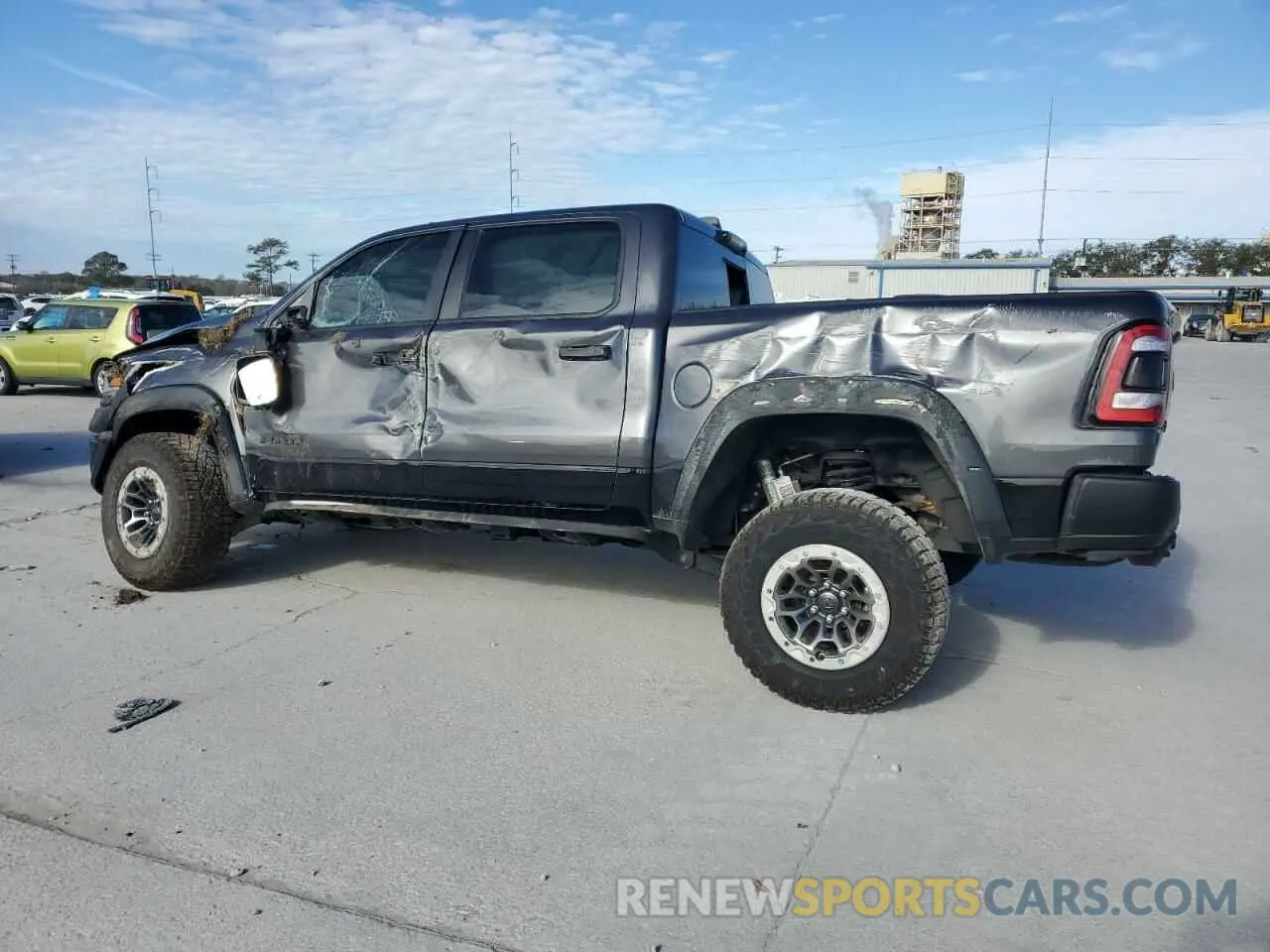 2 Photograph of a damaged car 1C6SRFU94MN829552 RAM 1500 2021