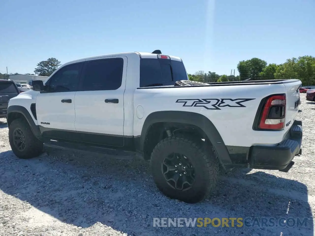 2 Photograph of a damaged car 1C6SRFU99MN756338 RAM 1500 2021