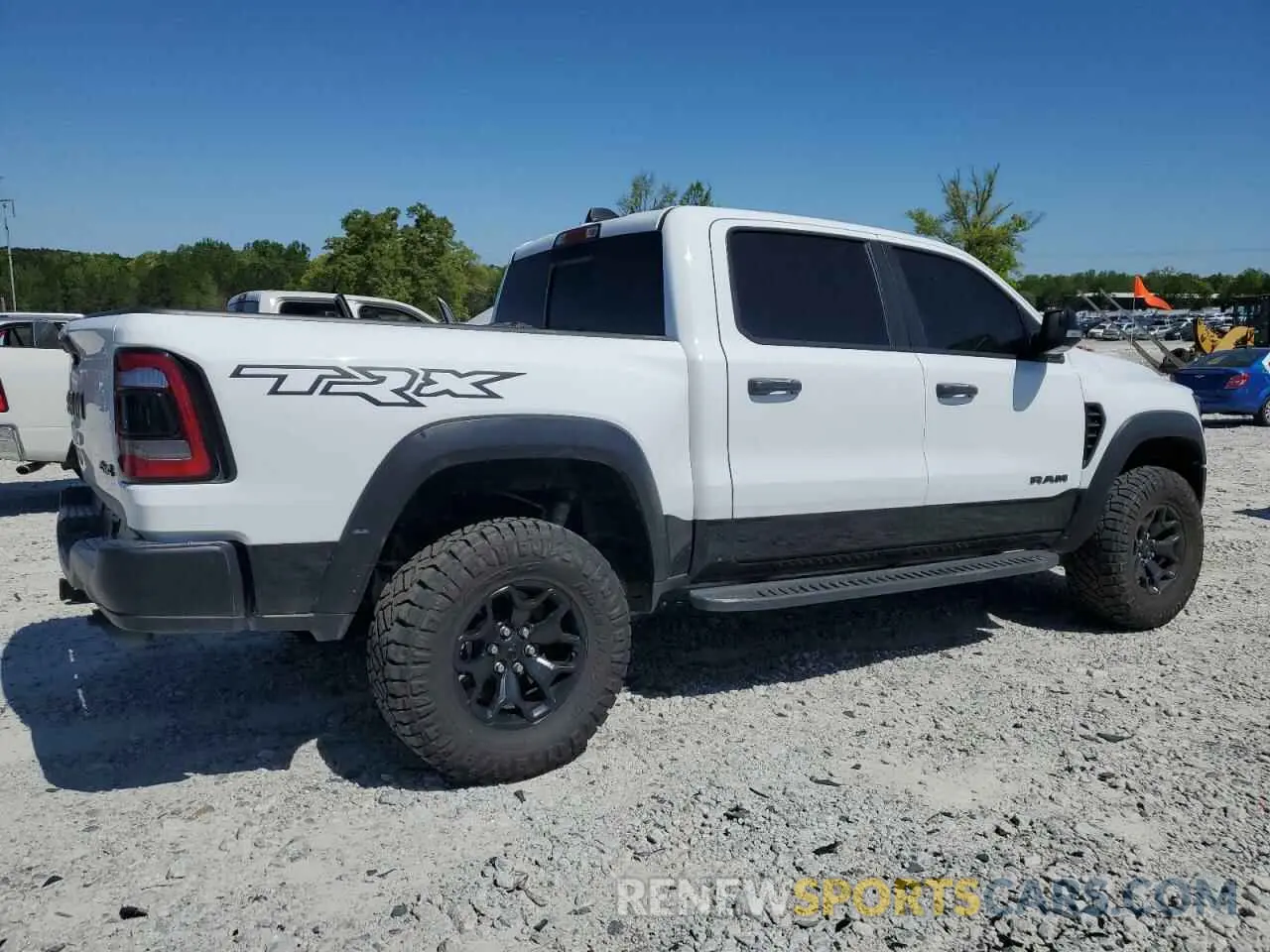 3 Photograph of a damaged car 1C6SRFU99MN756338 RAM 1500 2021