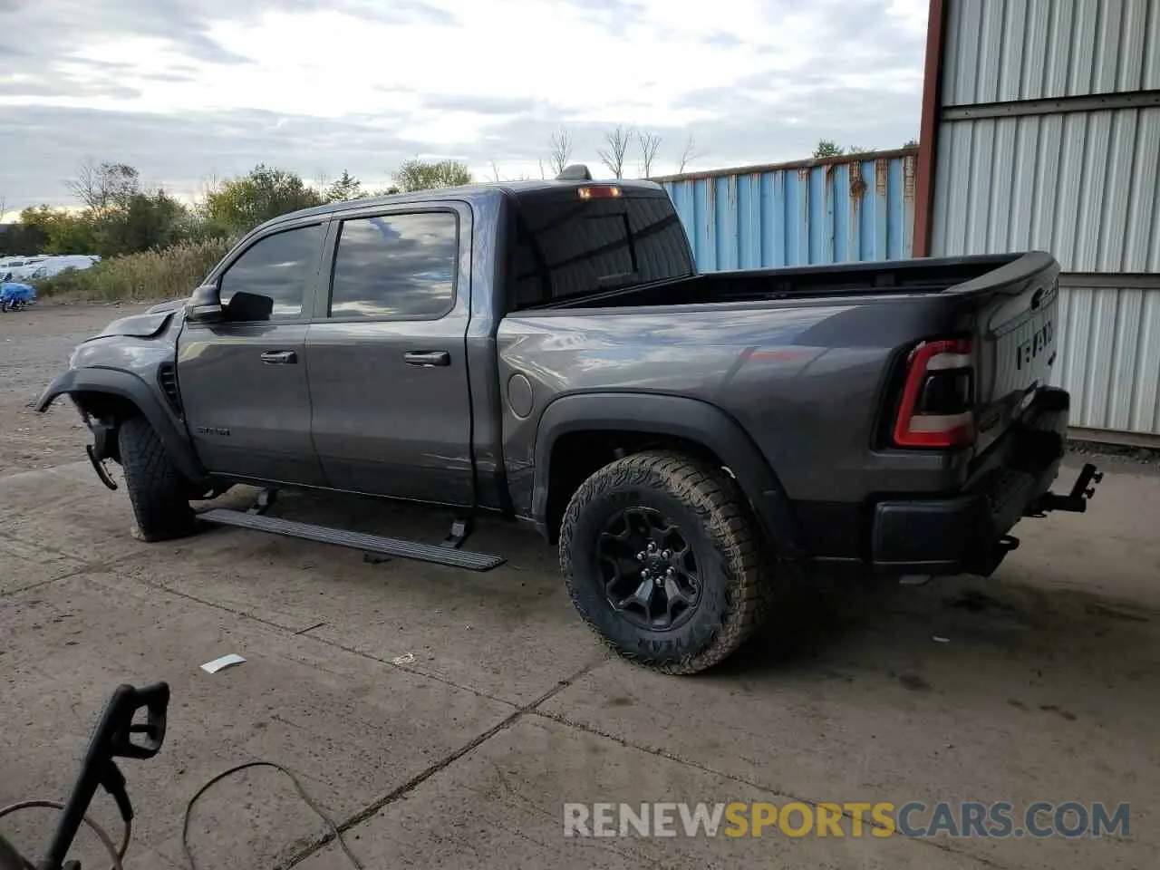 2 Photograph of a damaged car 1C6SRFU99MN804758 RAM 1500 2021