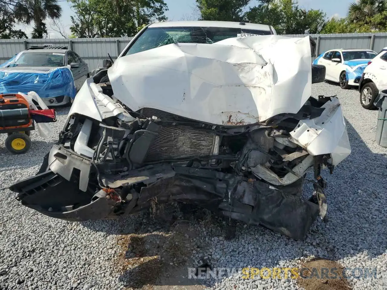 5 Photograph of a damaged car 3C6JR6DG7MG504087 RAM 1500 2021