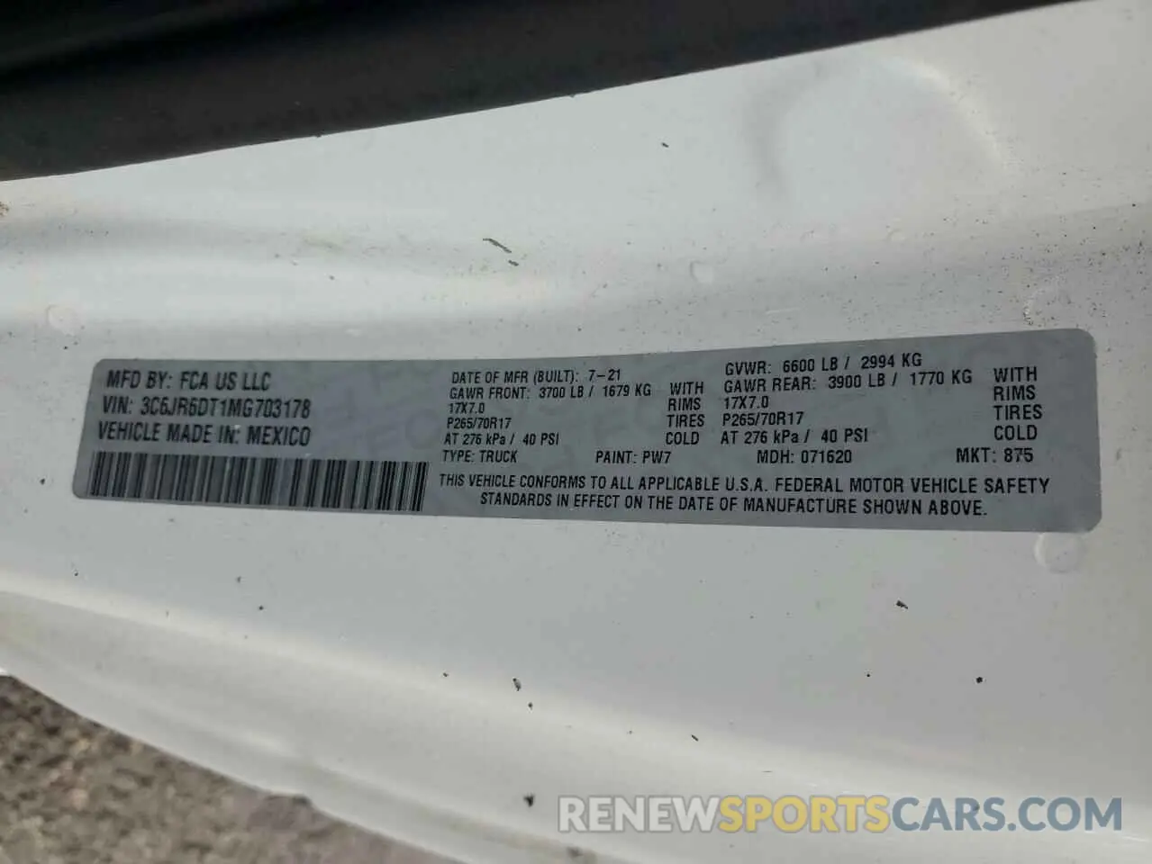 12 Photograph of a damaged car 3C6JR6DT1MG703178 RAM 1500 2021
