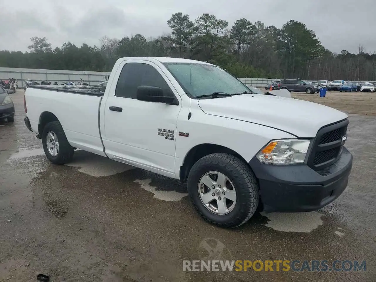 4 Photograph of a damaged car 3C6JR6DT1MG703178 RAM 1500 2021