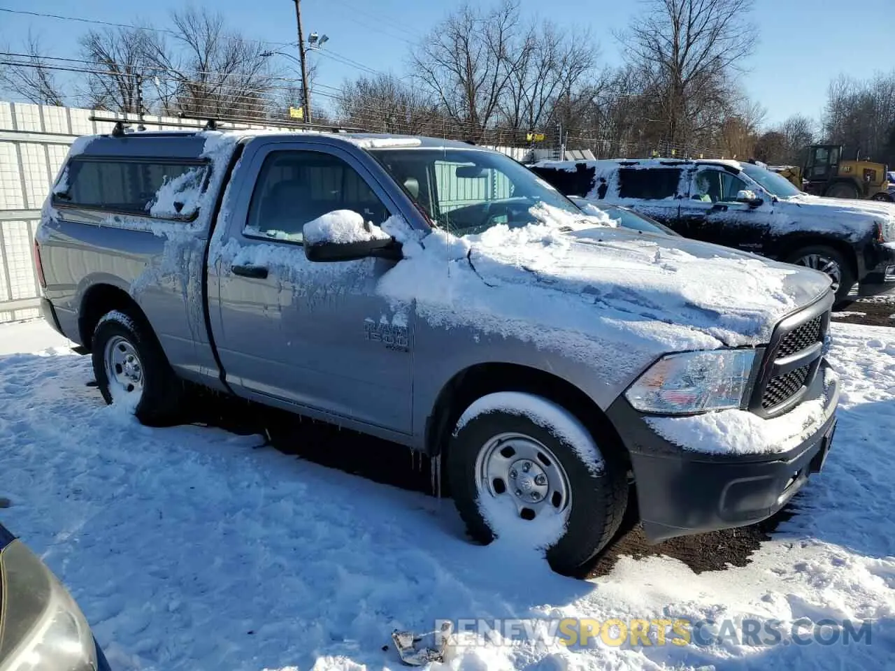 4 Photograph of a damaged car 3C6JR7AG2MG635289 RAM 1500 2021