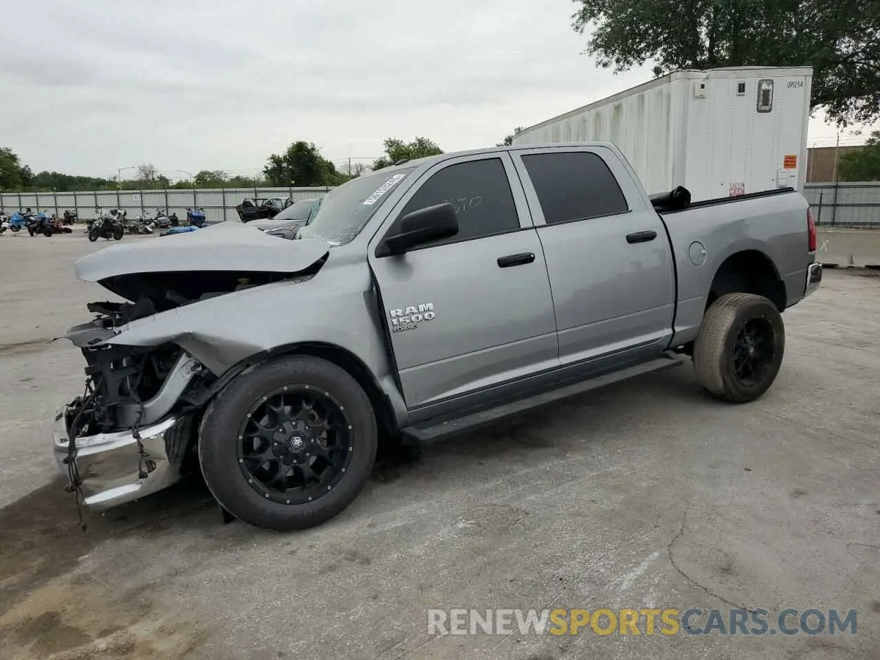 1 Photograph of a damaged car 3C6RR6KG3MG587376 RAM 1500 2021