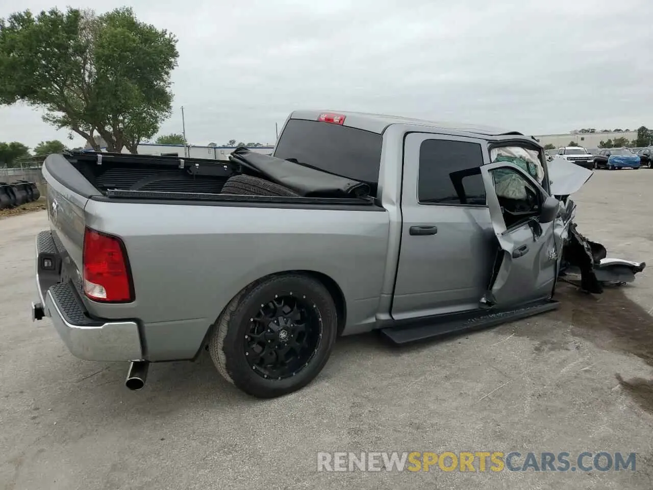 3 Photograph of a damaged car 3C6RR6KG3MG587376 RAM 1500 2021
