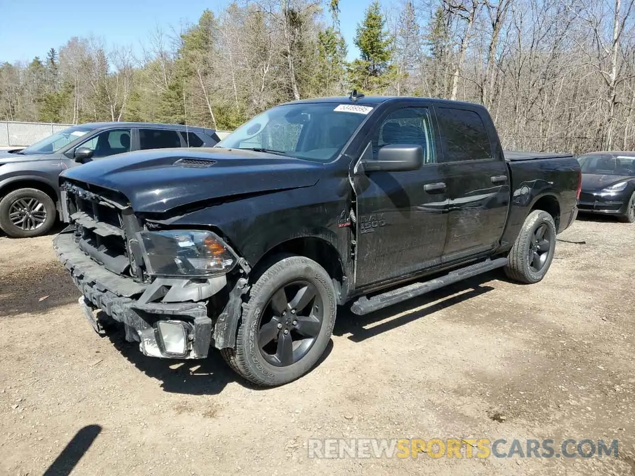 1 Photograph of a damaged car 3C6RR7KT4MG693581 RAM 1500 2021