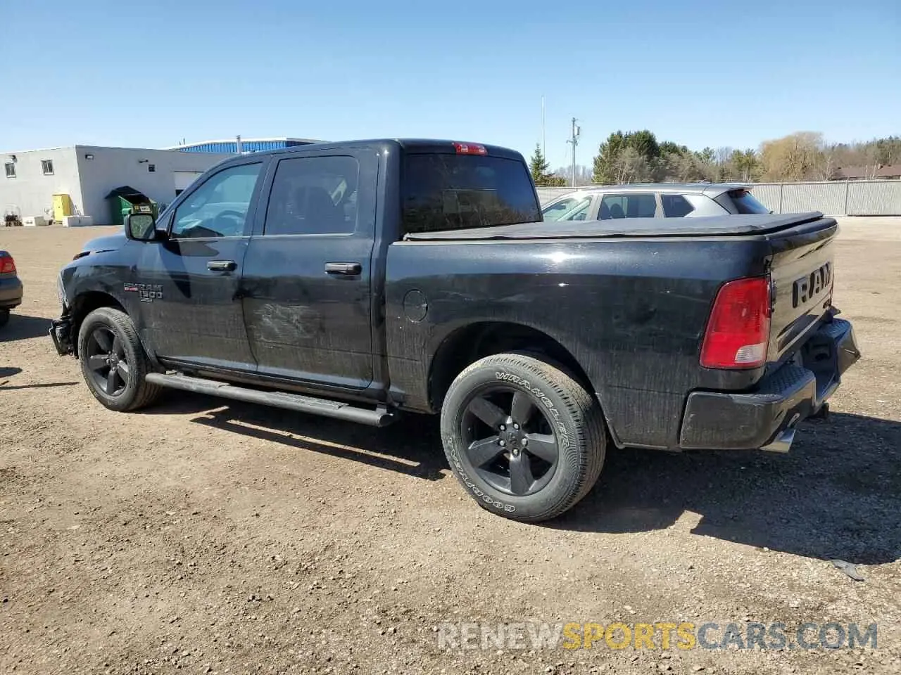 2 Photograph of a damaged car 3C6RR7KT4MG693581 RAM 1500 2021