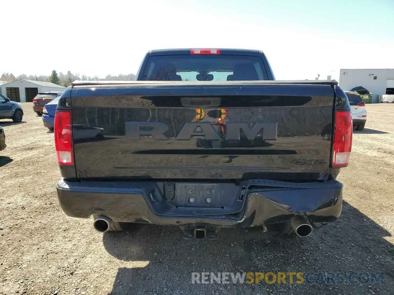 6 Photograph of a damaged car 3C6RR7KT4MG693581 RAM 1500 2021