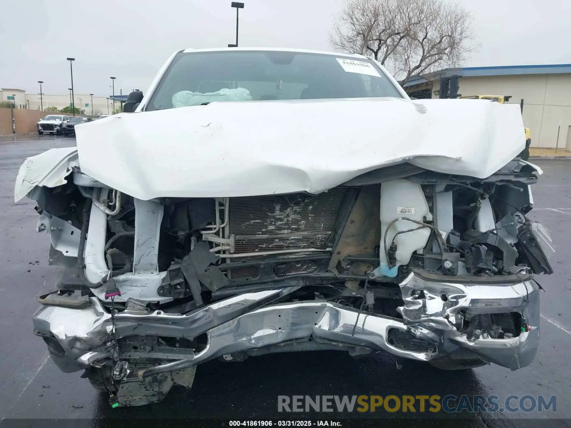 13 Photograph of a damaged car 1C6RREBG0NN272893 RAM 1500 2022