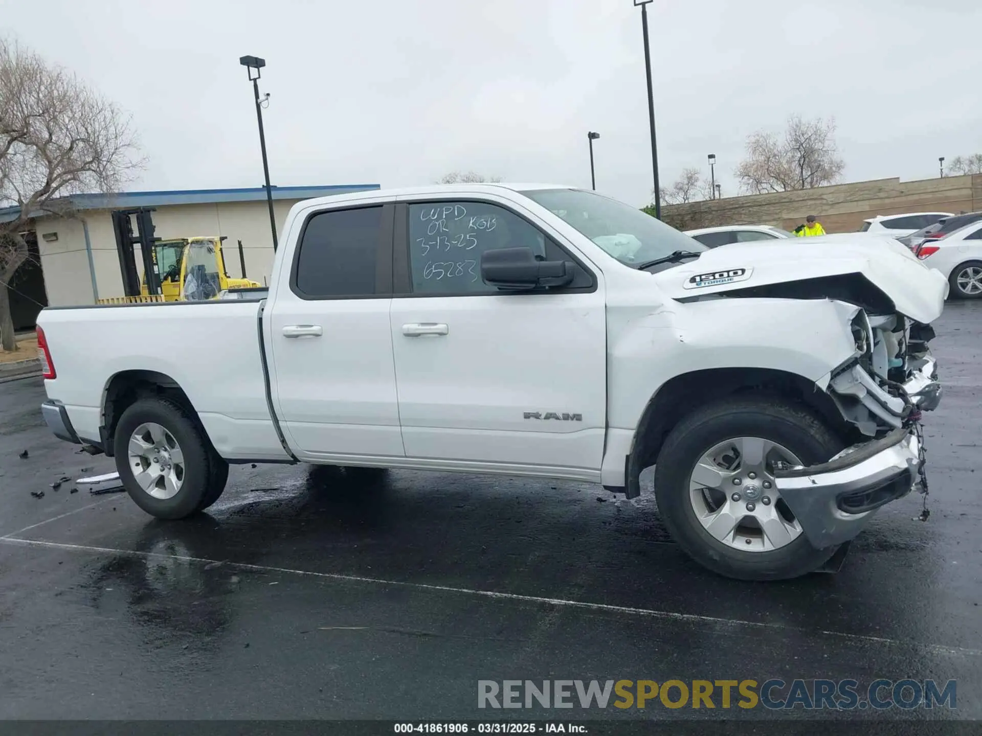14 Photograph of a damaged car 1C6RREBG0NN272893 RAM 1500 2022