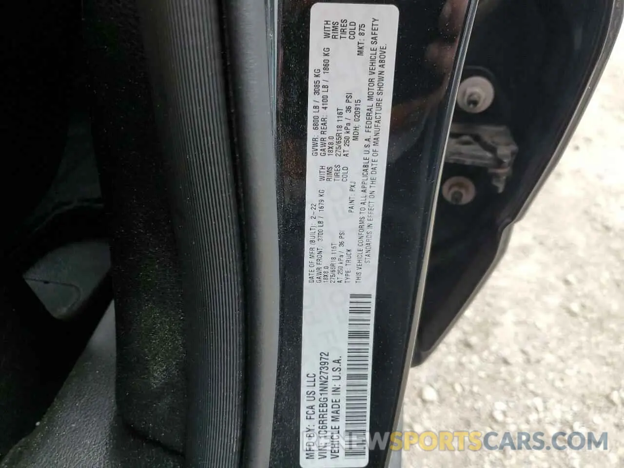 13 Photograph of a damaged car 1C6RREBG1NN273972 RAM 1500 2022