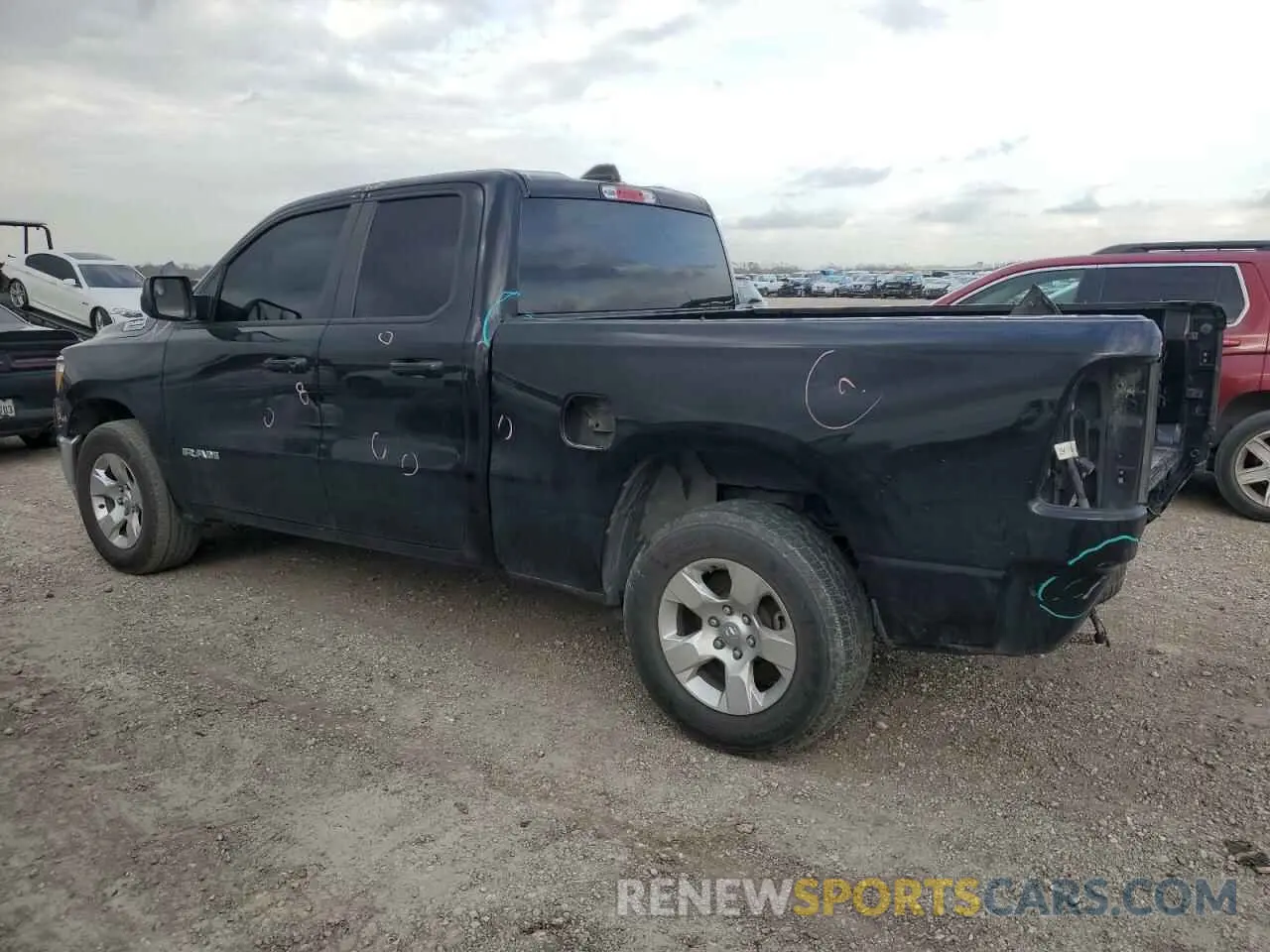 2 Photograph of a damaged car 1C6RREBG1NN273972 RAM 1500 2022