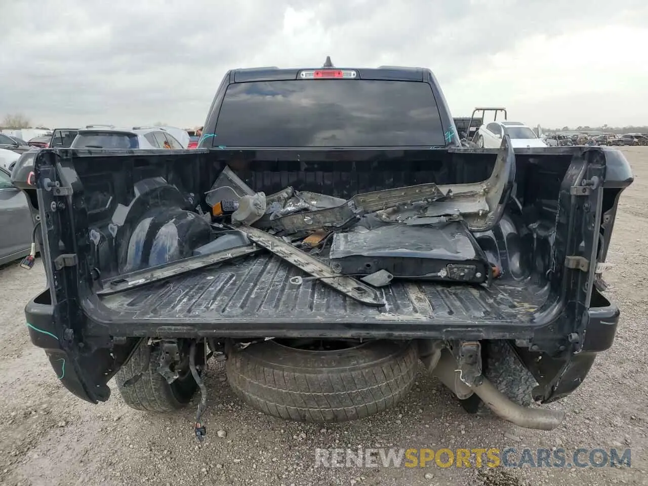 6 Photograph of a damaged car 1C6RREBG1NN273972 RAM 1500 2022