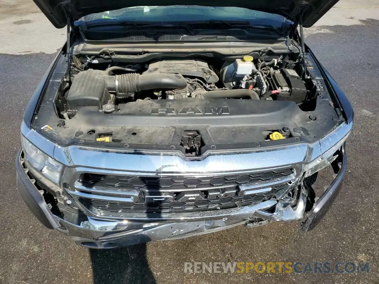 11 Photograph of a damaged car 1C6RREBT0NN231600 RAM 1500 2022