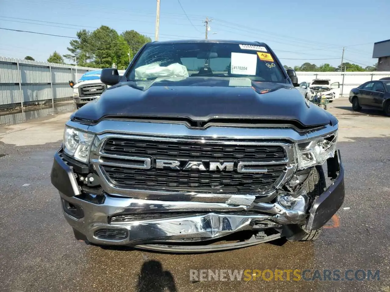 5 Photograph of a damaged car 1C6RREBT0NN231600 RAM 1500 2022