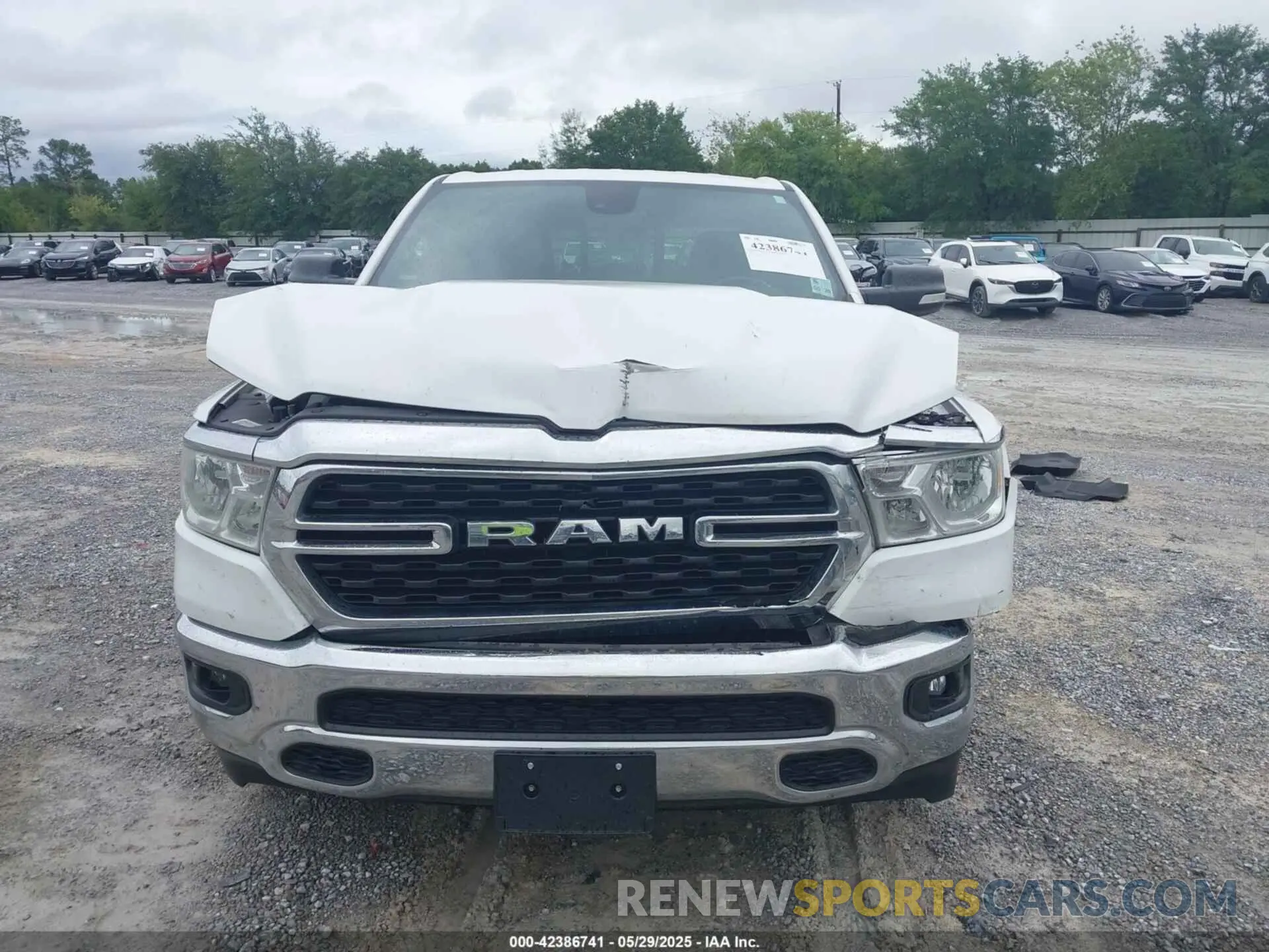 12 Photograph of a damaged car 1C6RREBT0NN393596 RAM 1500 2022