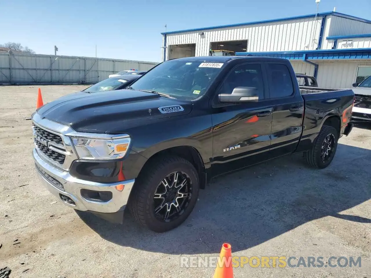 1 Photograph of a damaged car 1C6RREBT1NN219102 RAM 1500 2022