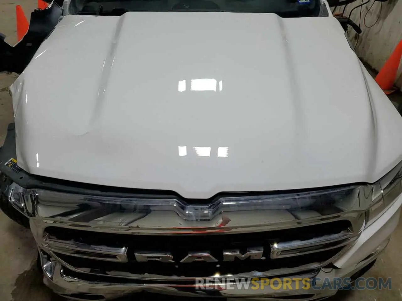 11 Фотография поврежденного автомобиля 1C6RREBT3NN124878 RAM 1500 2022