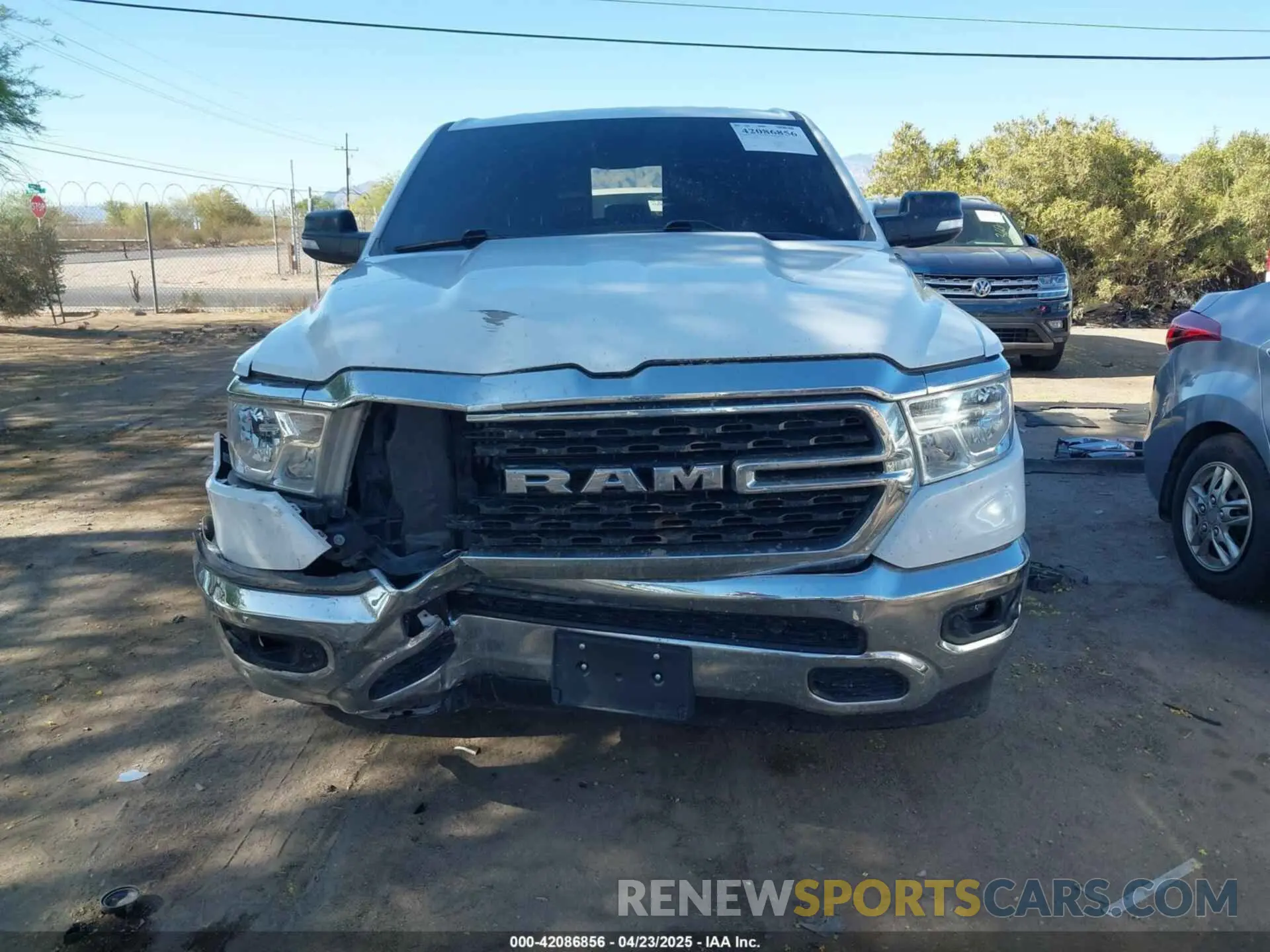 13 Photograph of a damaged car 1C6RREBT6NN274404 RAM 1500 2022