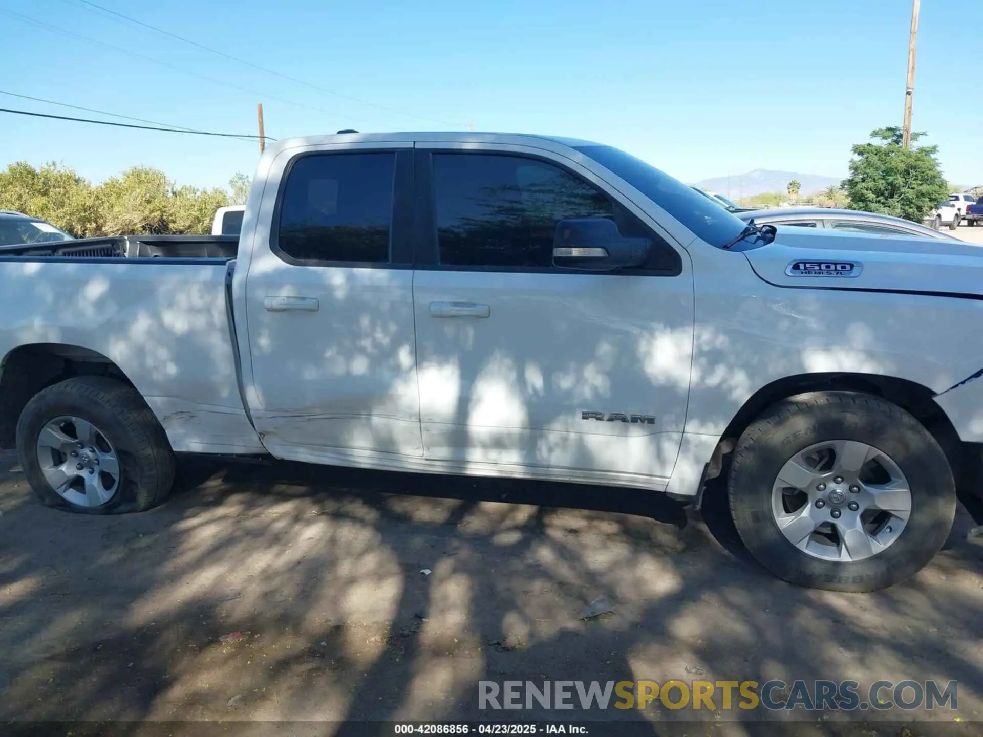14 Photograph of a damaged car 1C6RREBT6NN274404 RAM 1500 2022