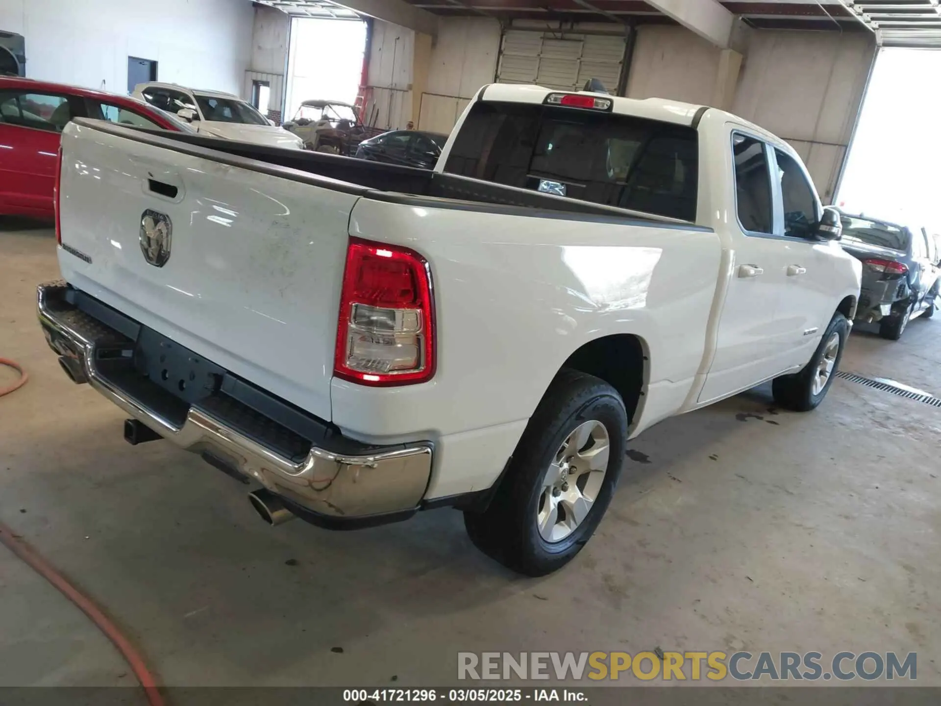 4 Photograph of a damaged car 1C6RREBT7NN104956 RAM 1500 2022