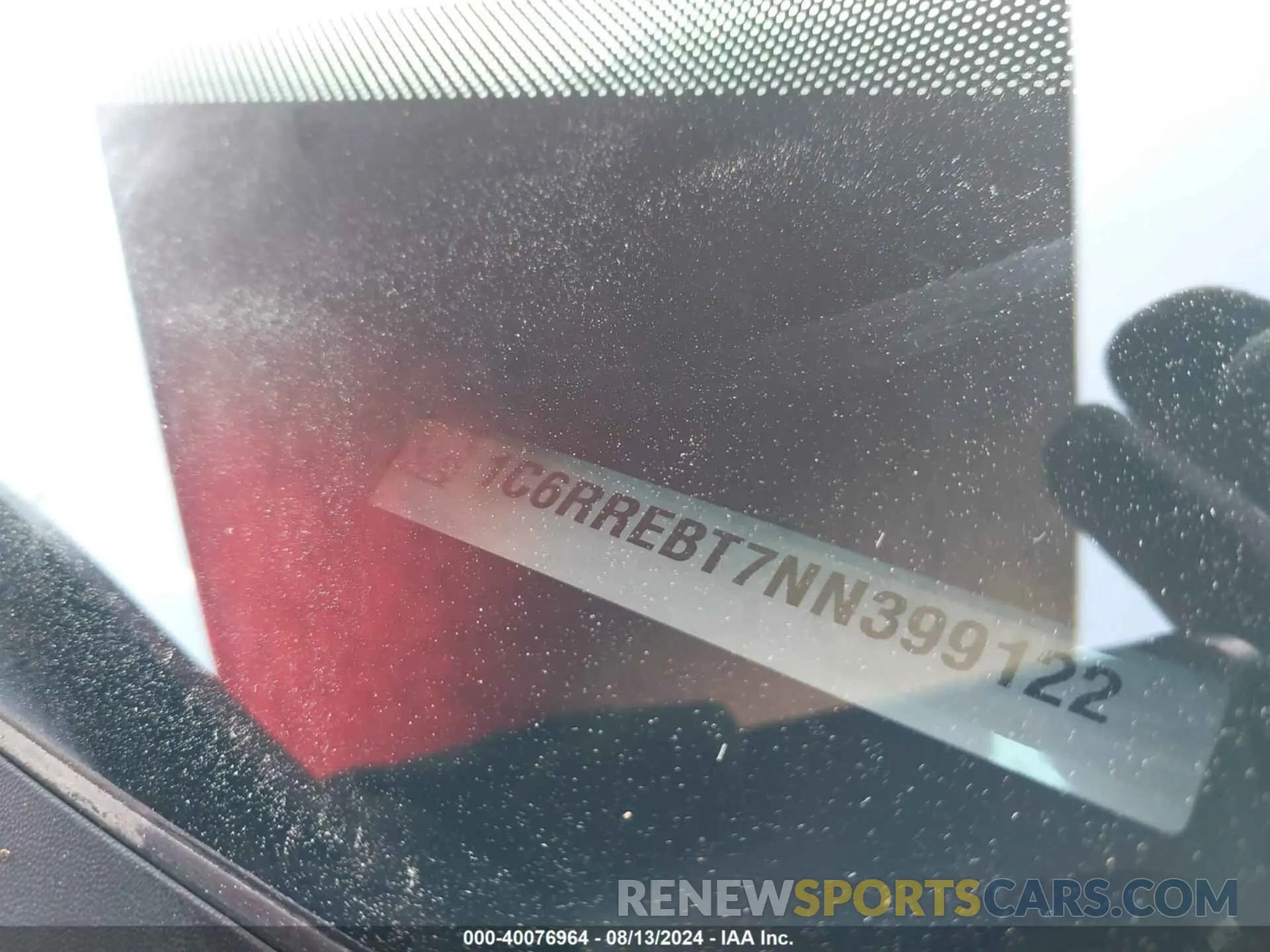 9 Photograph of a damaged car 1C6RREBT7NN399122 RAM 1500 2022