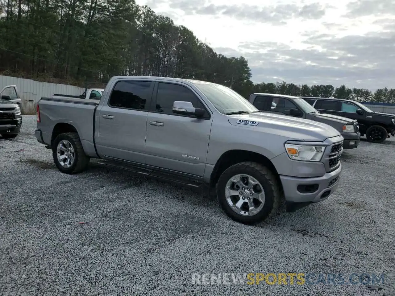 4 Photograph of a damaged car 1C6RREFG5NN398984 RAM 1500 2022
