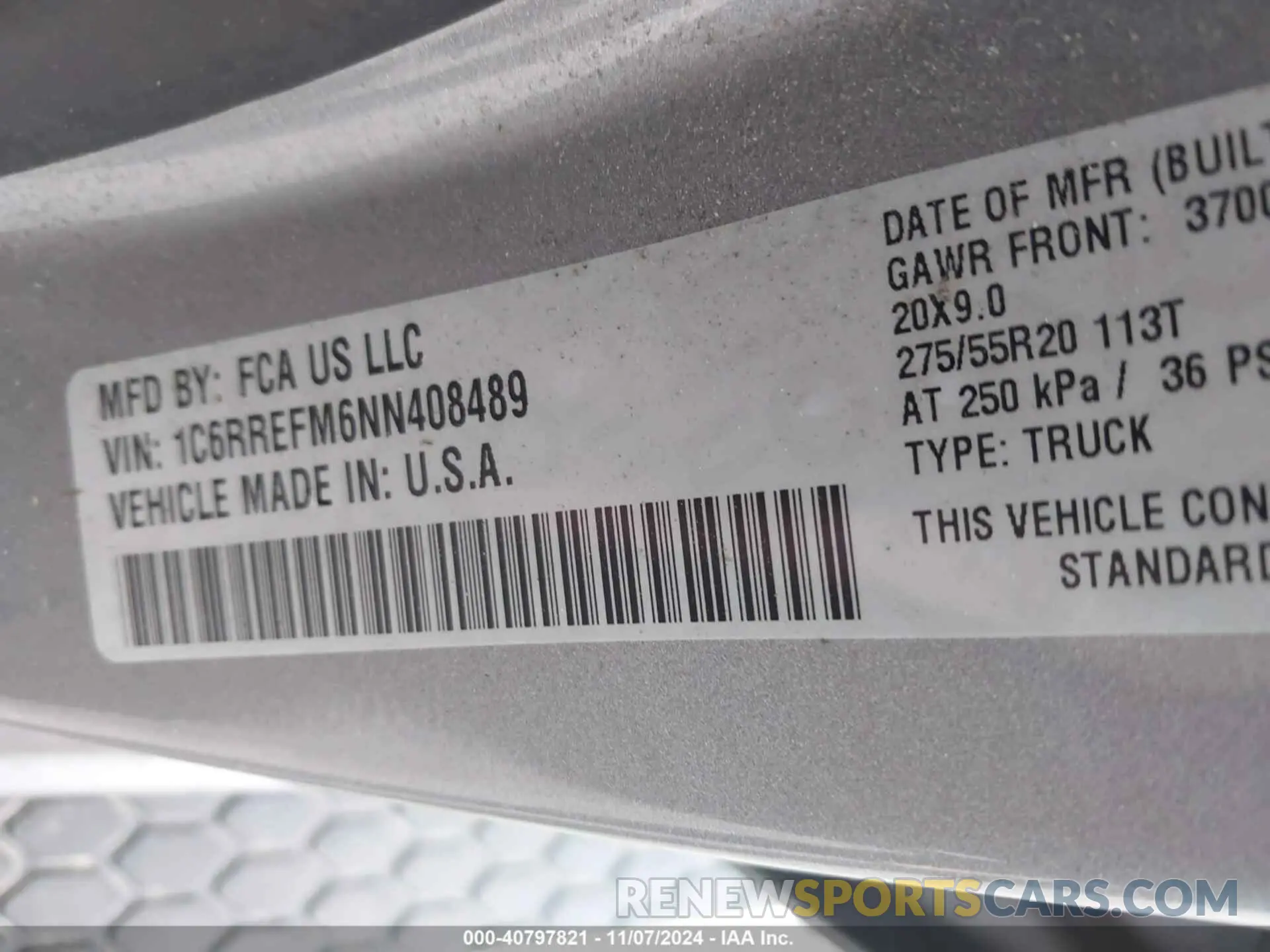 9 Photograph of a damaged car 1C6RREFM6NN408489 RAM 1500 2022