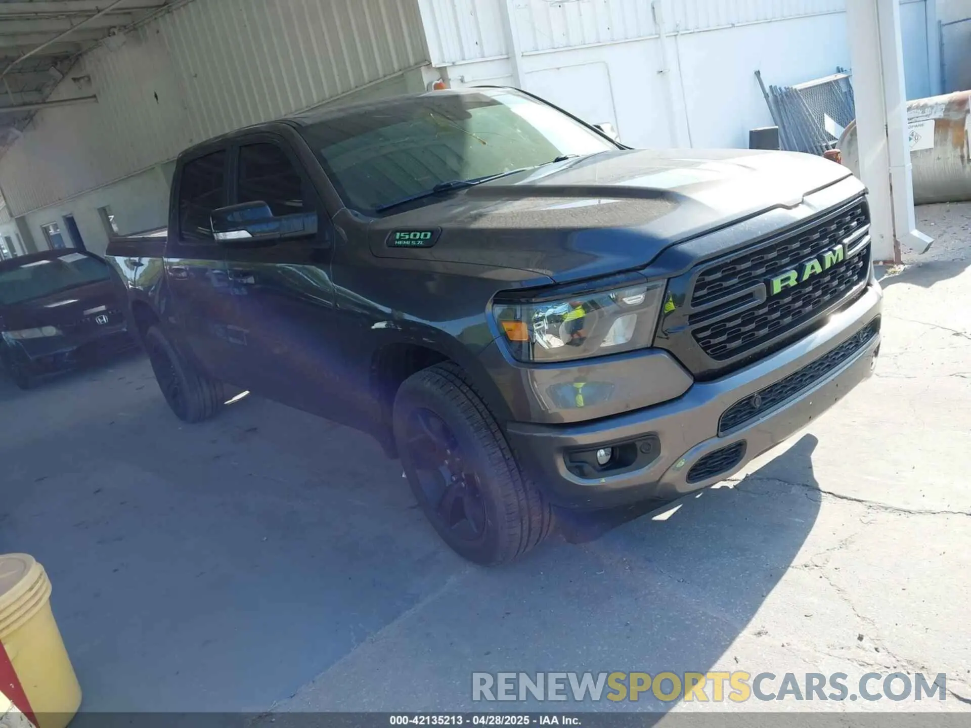 1 Photograph of a damaged car 1C6RREFT4NN218519 RAM 1500 2022